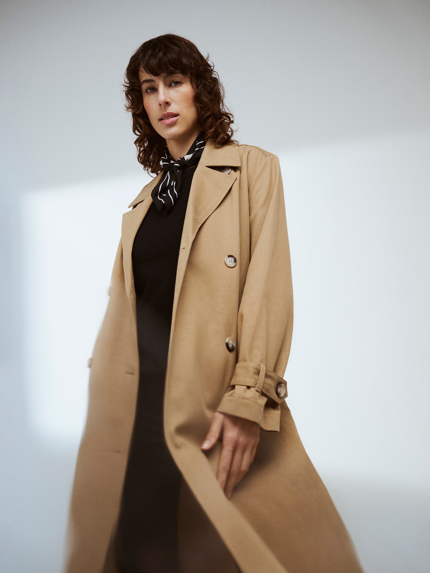Nanso women's Klaara trench coat in brown on a model