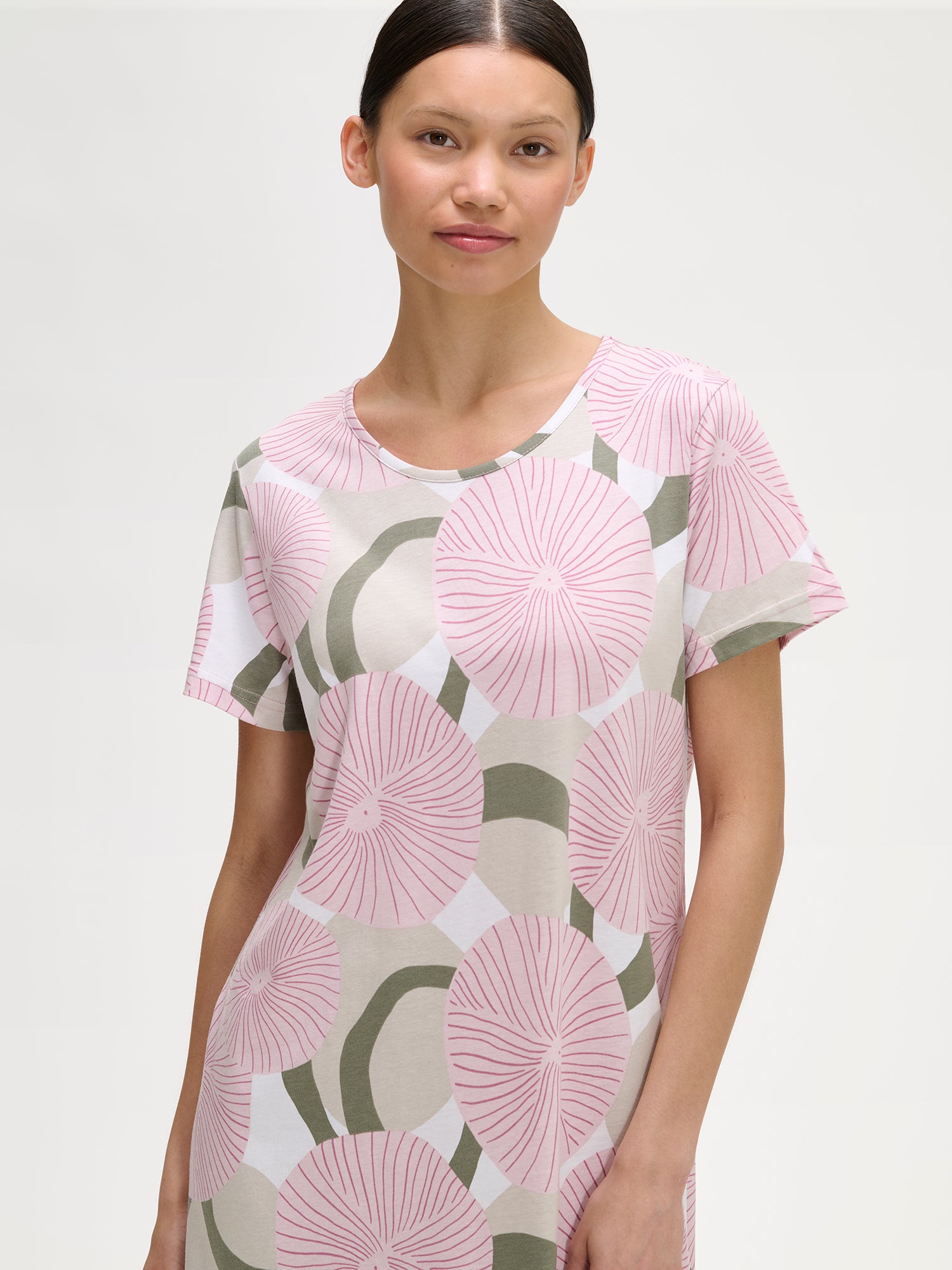 HEDDA Long Nightgown features a delicate pink-toned pattern. Pictured on amodel, close-up