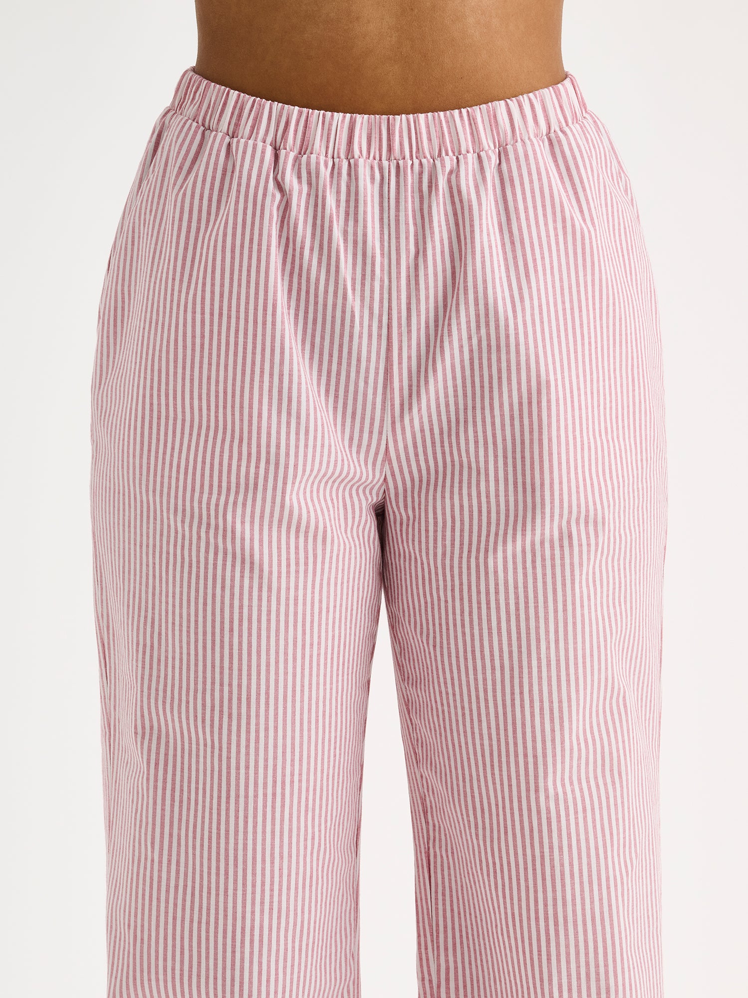 Stylish, wonderfully lightweight and comfortable striped Tauko pajama pants on a model close-up