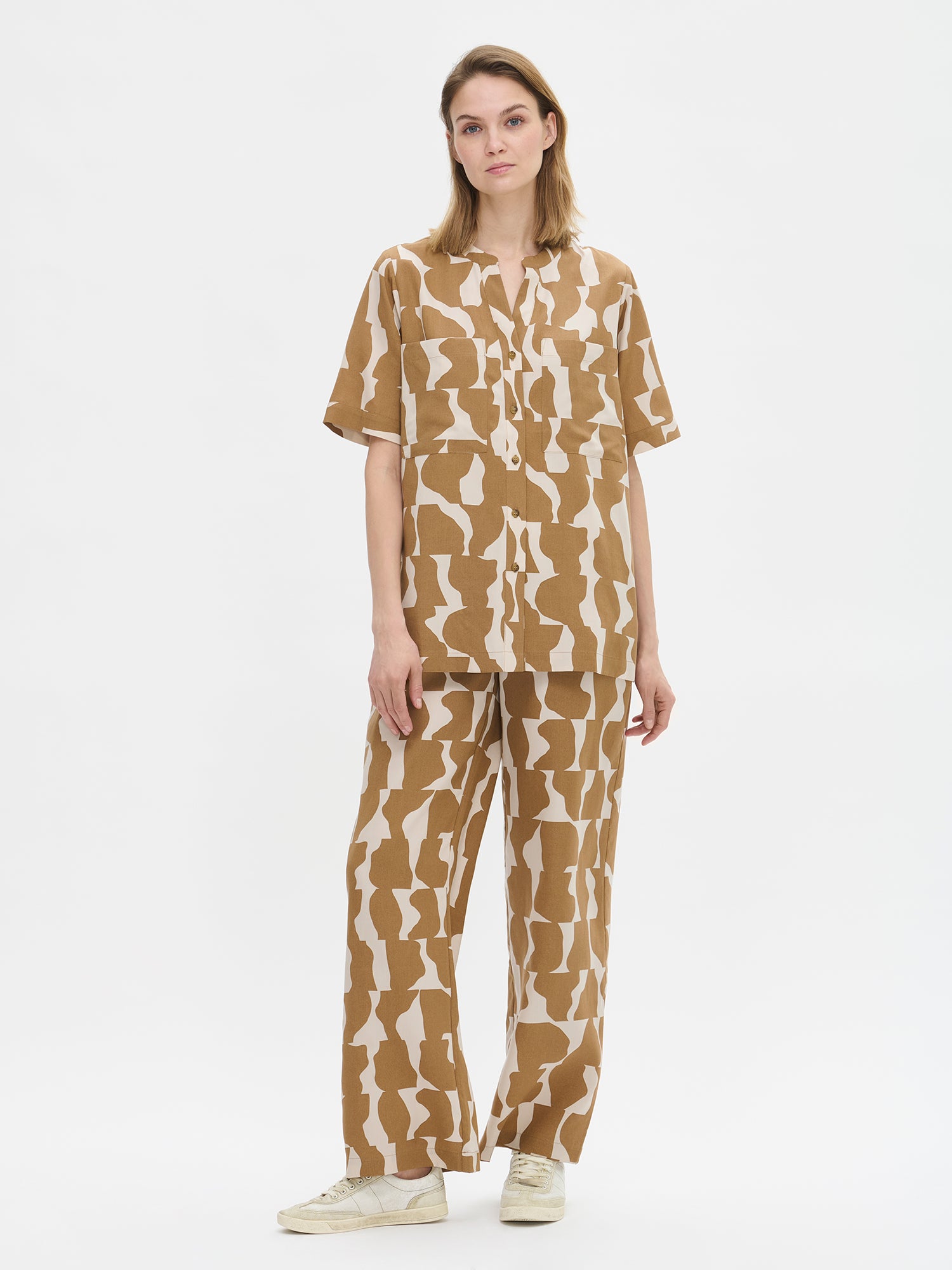 Nanso women's SORAJA Trousers and Blouse  in rich brown on a model