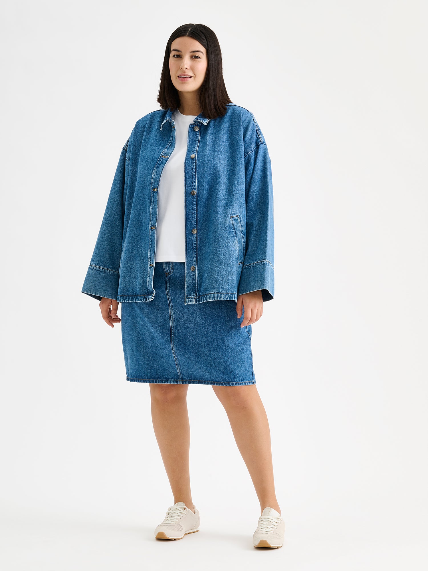 Nanso women's Doris denim jacket on a model with denim skirt and a white t-shirt