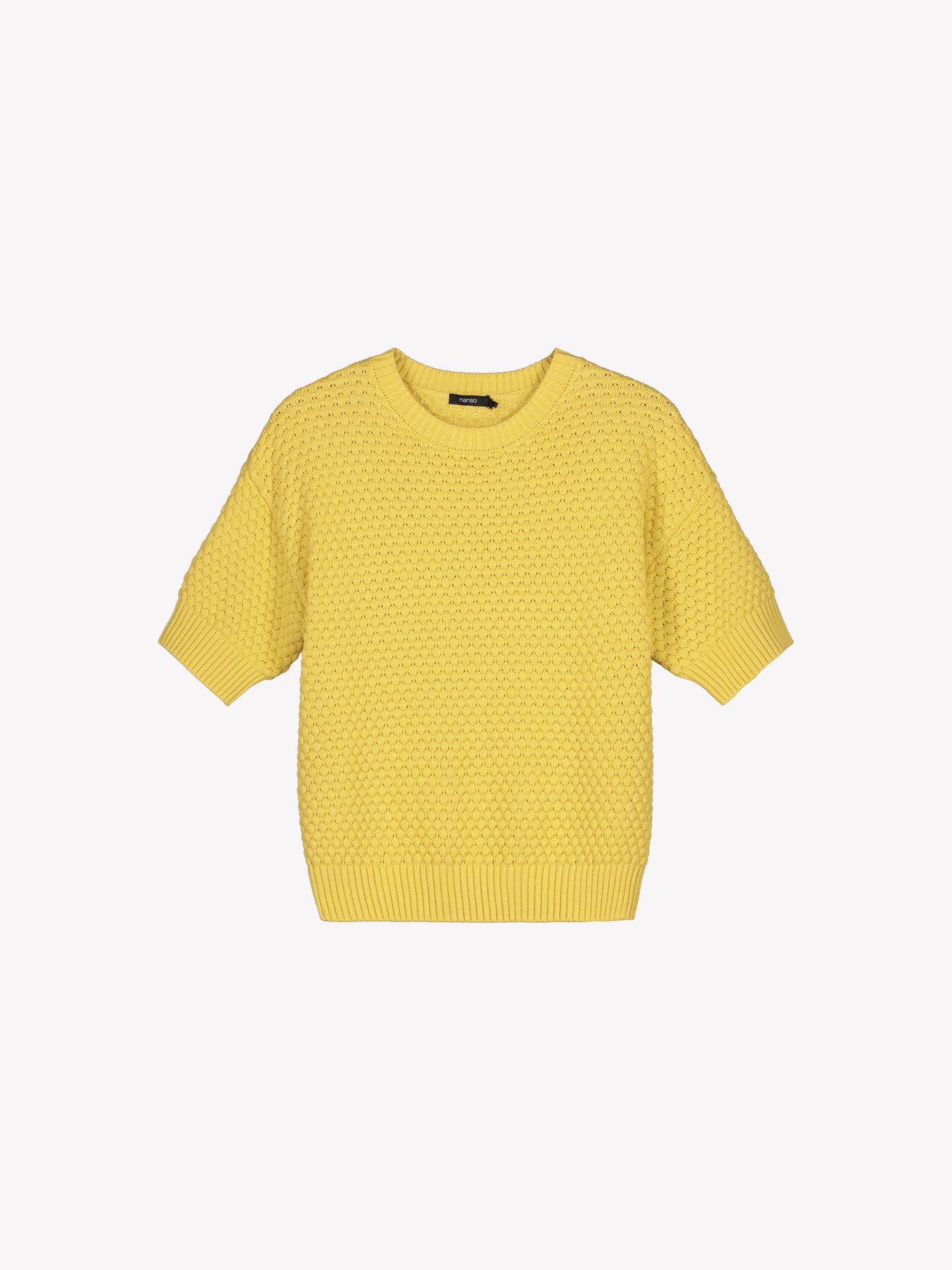 Nanso women's Kumpu versatile short-sleeved knit sweater in a product picture.