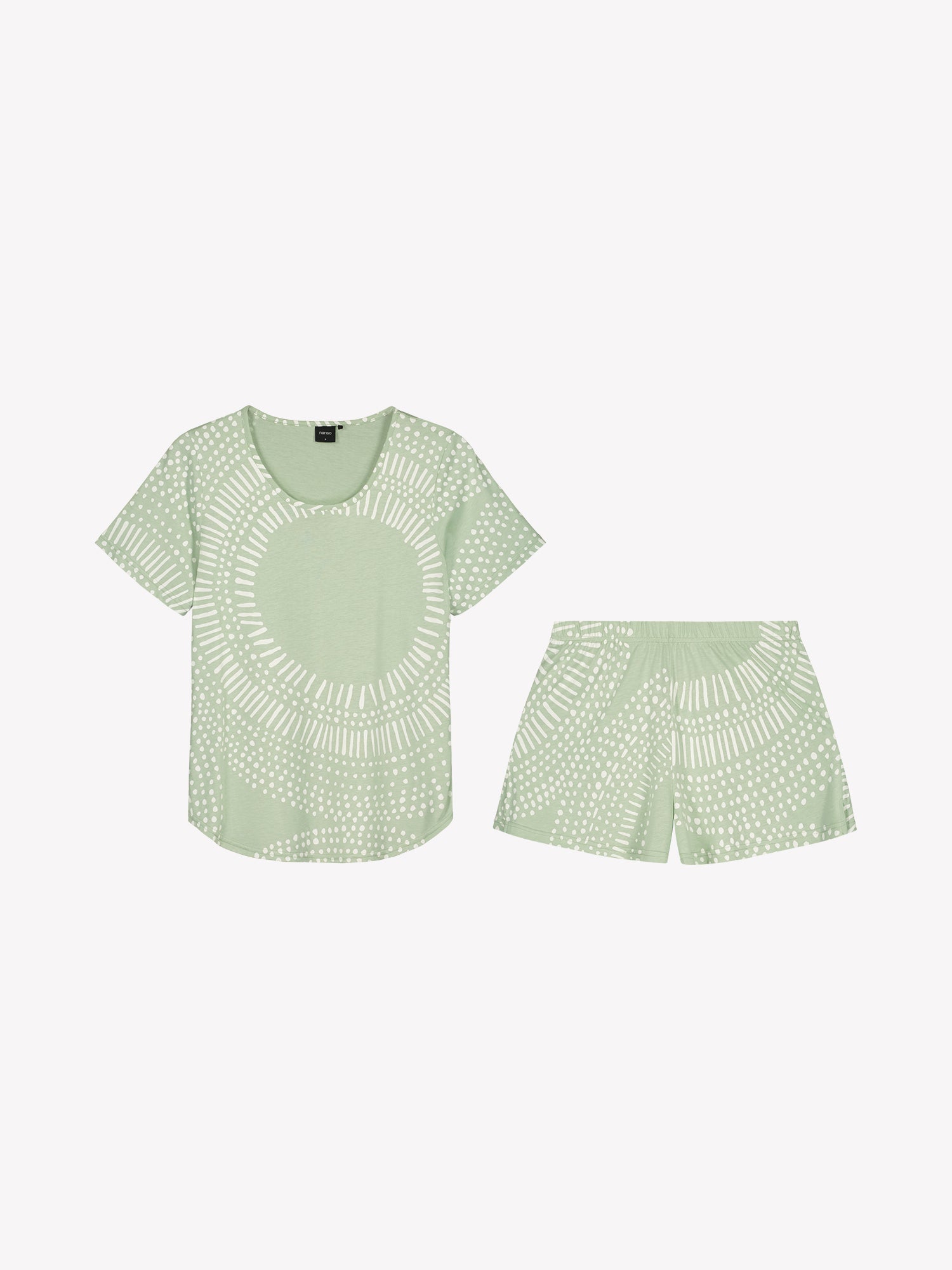 Nanso comfortable light green Aura shorts pyjamas featuring a stylish, harmonious pattern in a product picture.