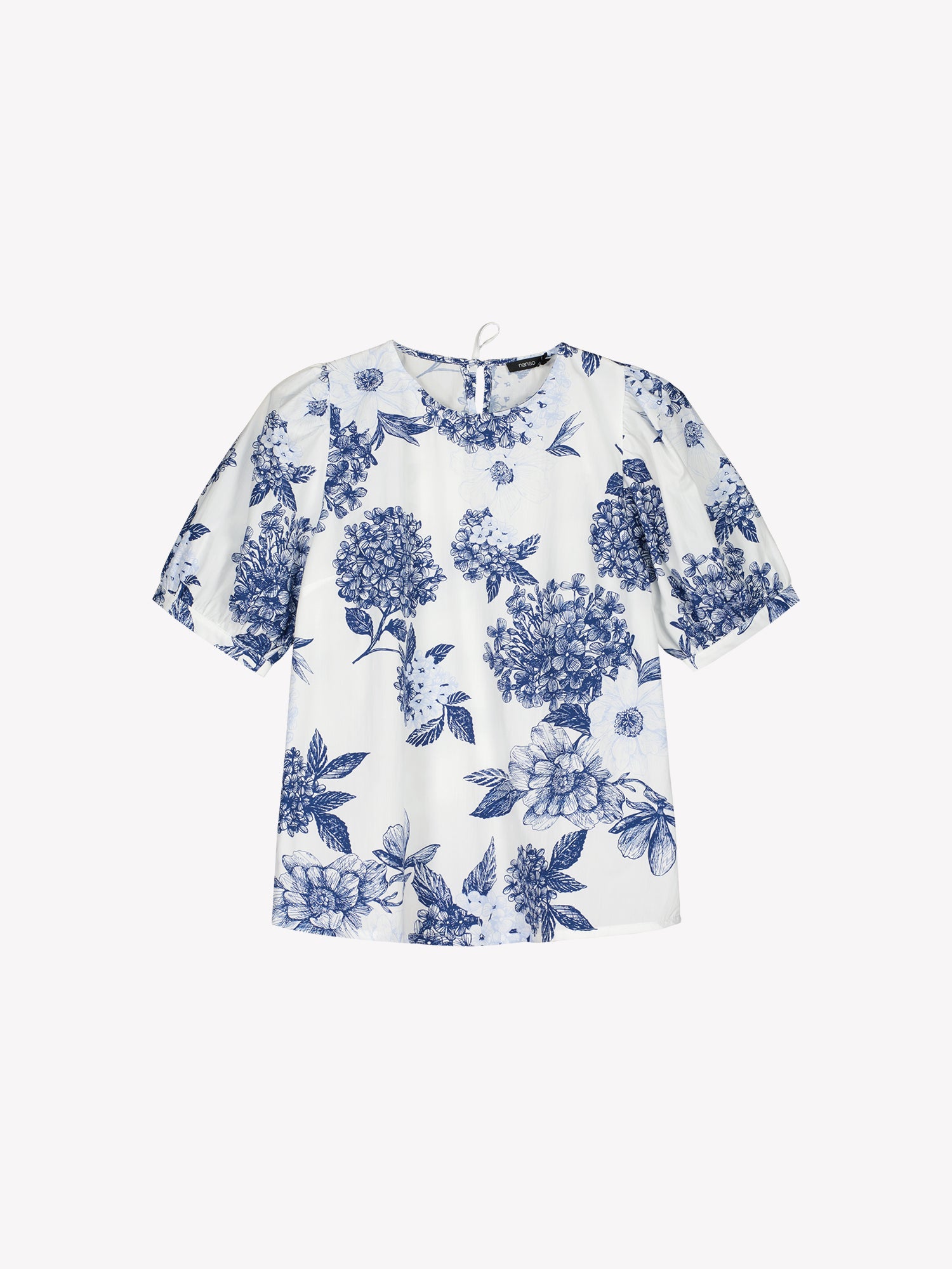 Palatsi blouse features a delicate floral pattern in blue and white, product picture