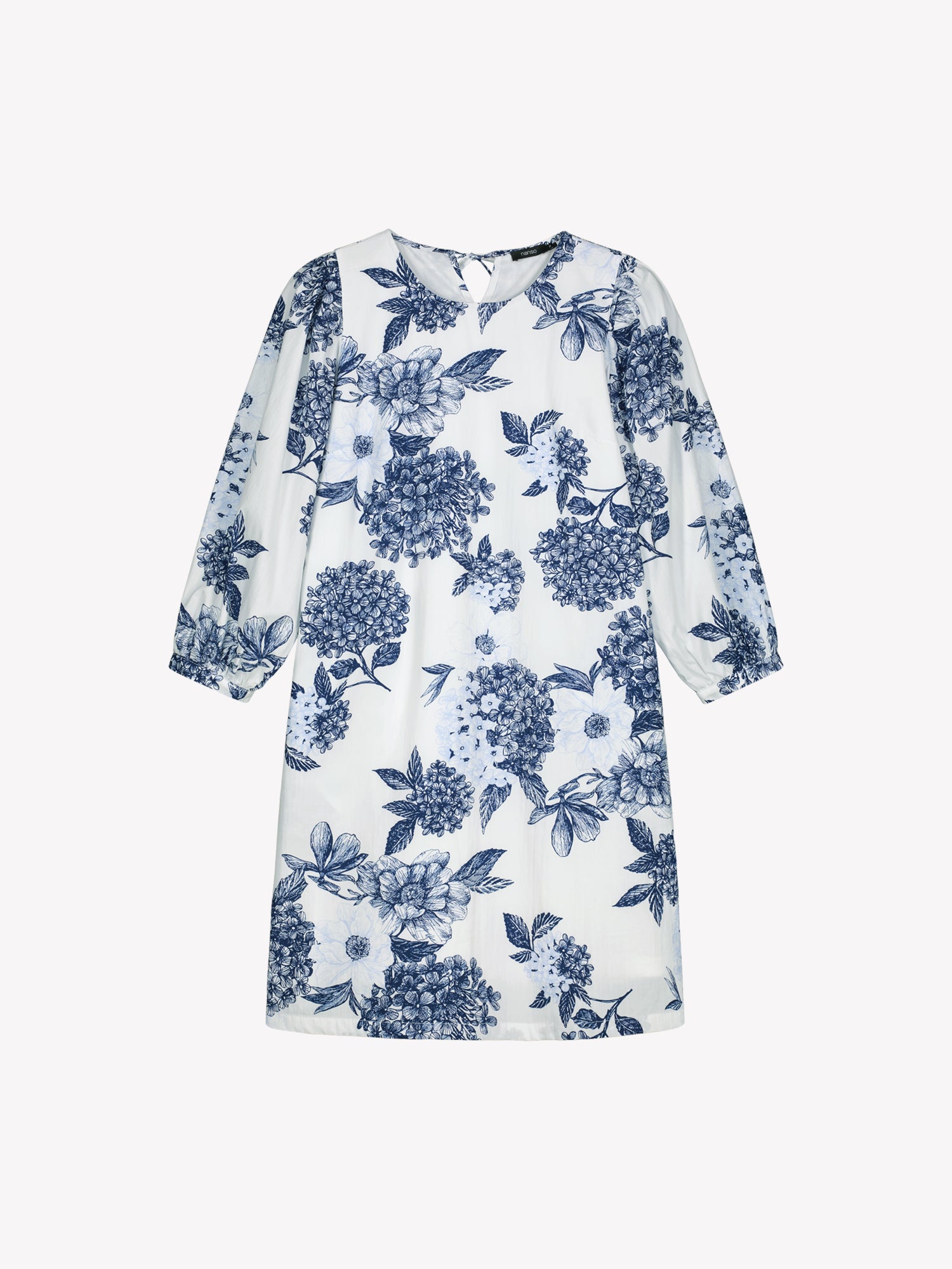 Nanso Palatsi Dress in a striking blue and white floral pattern in a product picture.