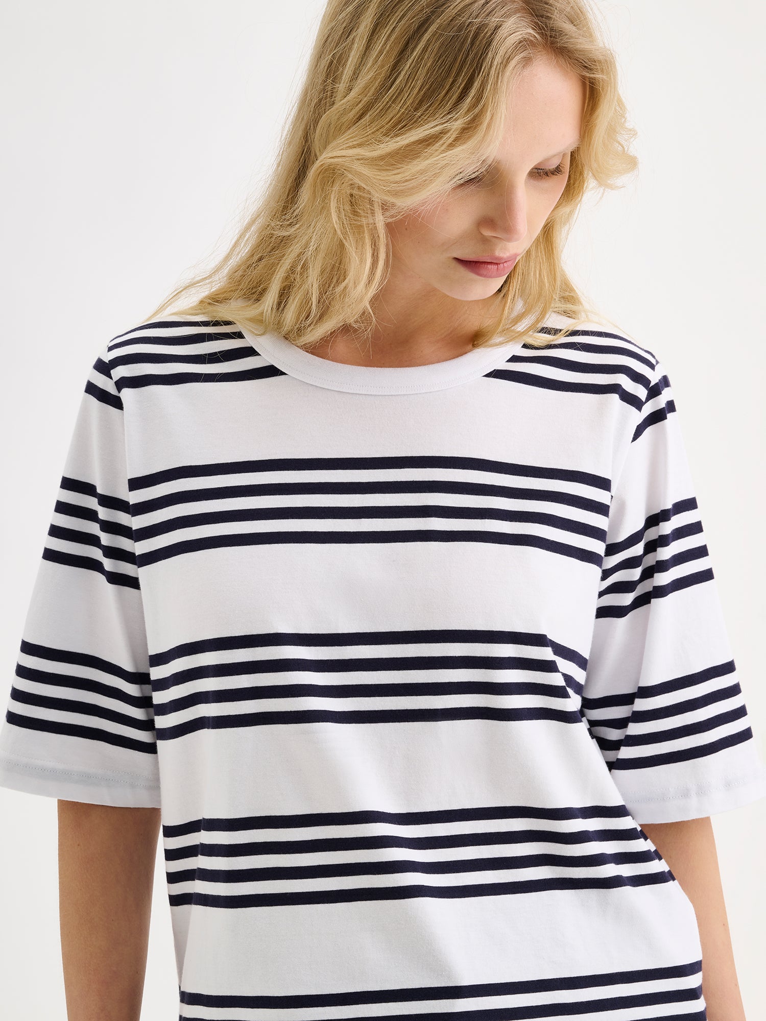 Nanso women's fresh striped navy and white Merina t-shirt on a model close-up.