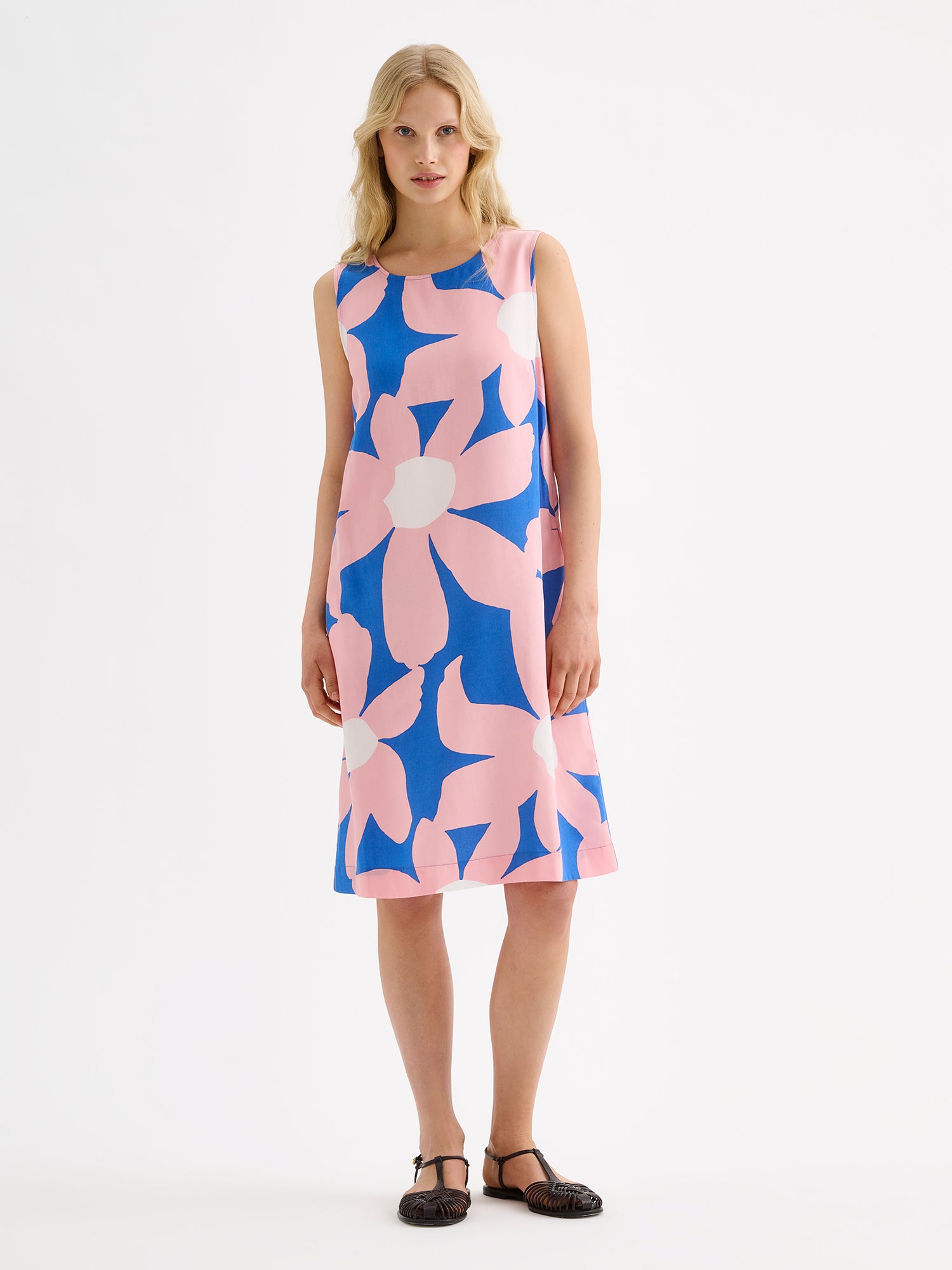 Nanso women's patterned sleeveless ROSI dress on a model with black sandals