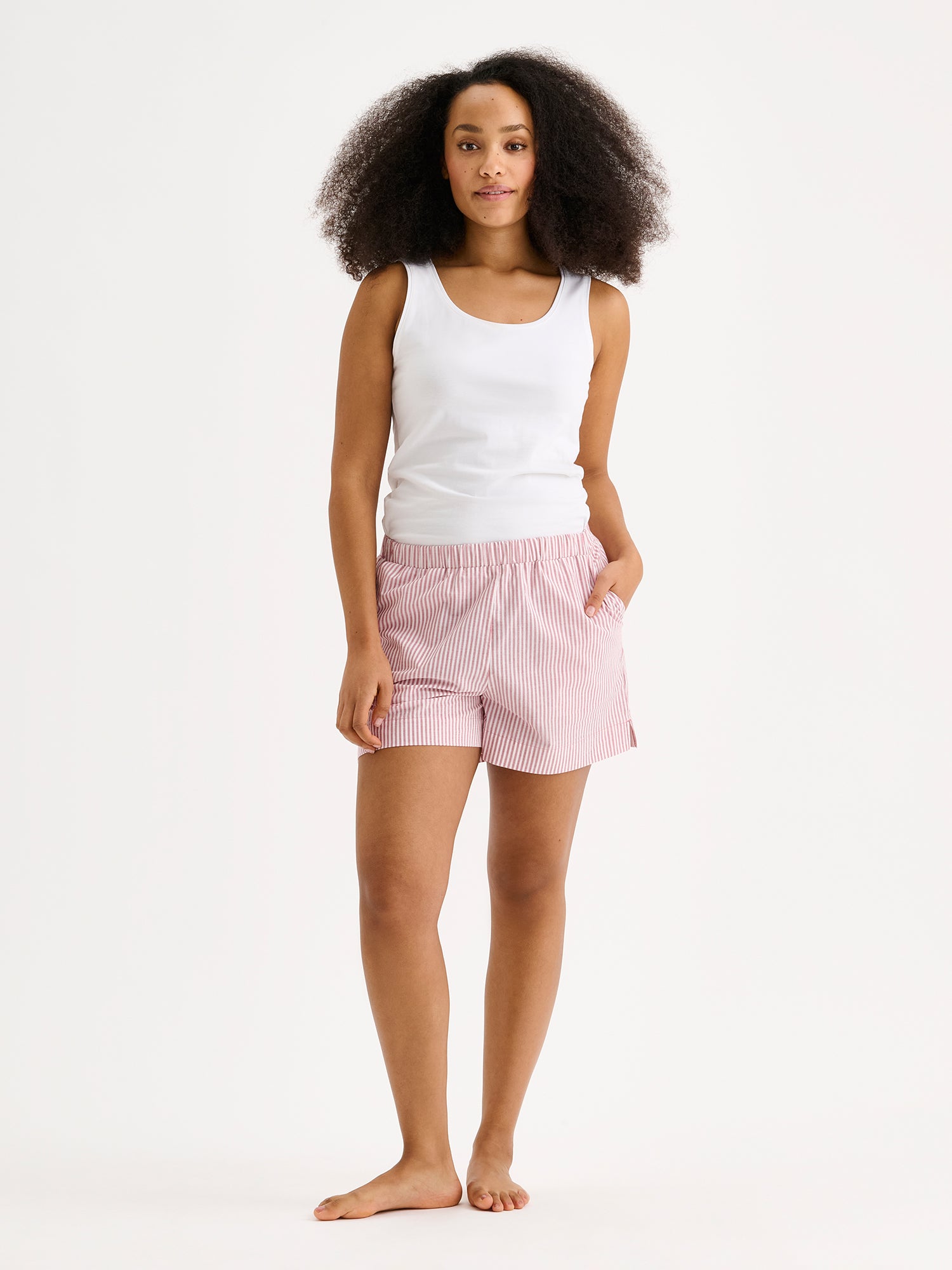 Nanso women's lightweight and comfortable striped Tauko shorts on a model with a white top