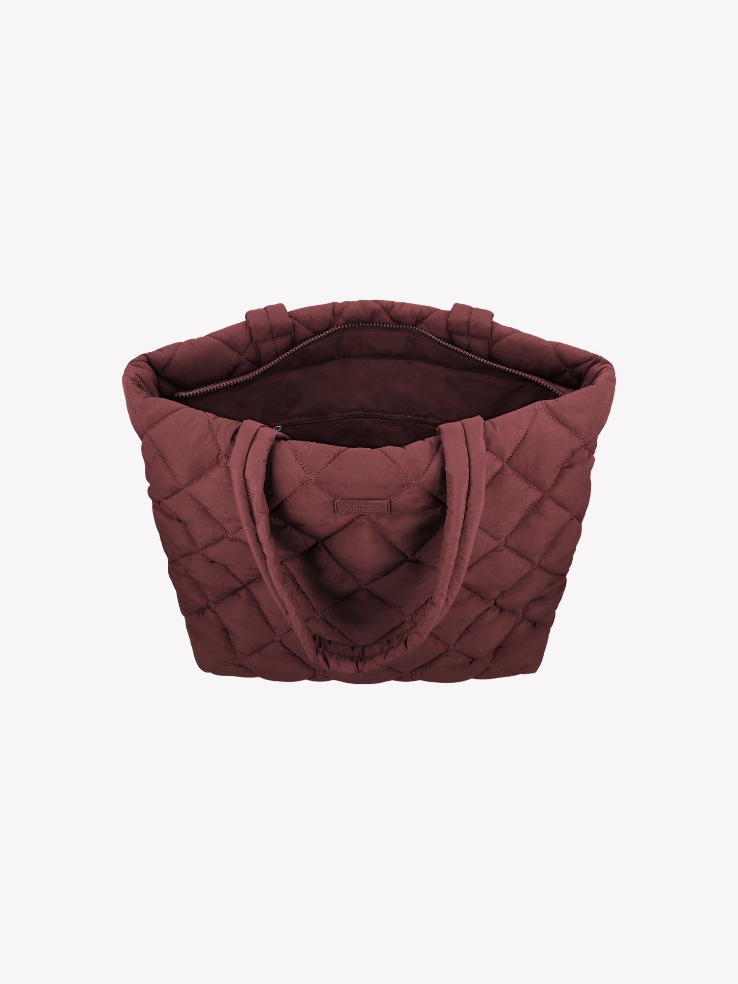 Nanso's trendy winered Maxi Vanu tote bag is crafted from quilted fabric with a thin padding and an elegant stitched pattern on the outer material. It features a zipper closure for secure carrying. Product picture