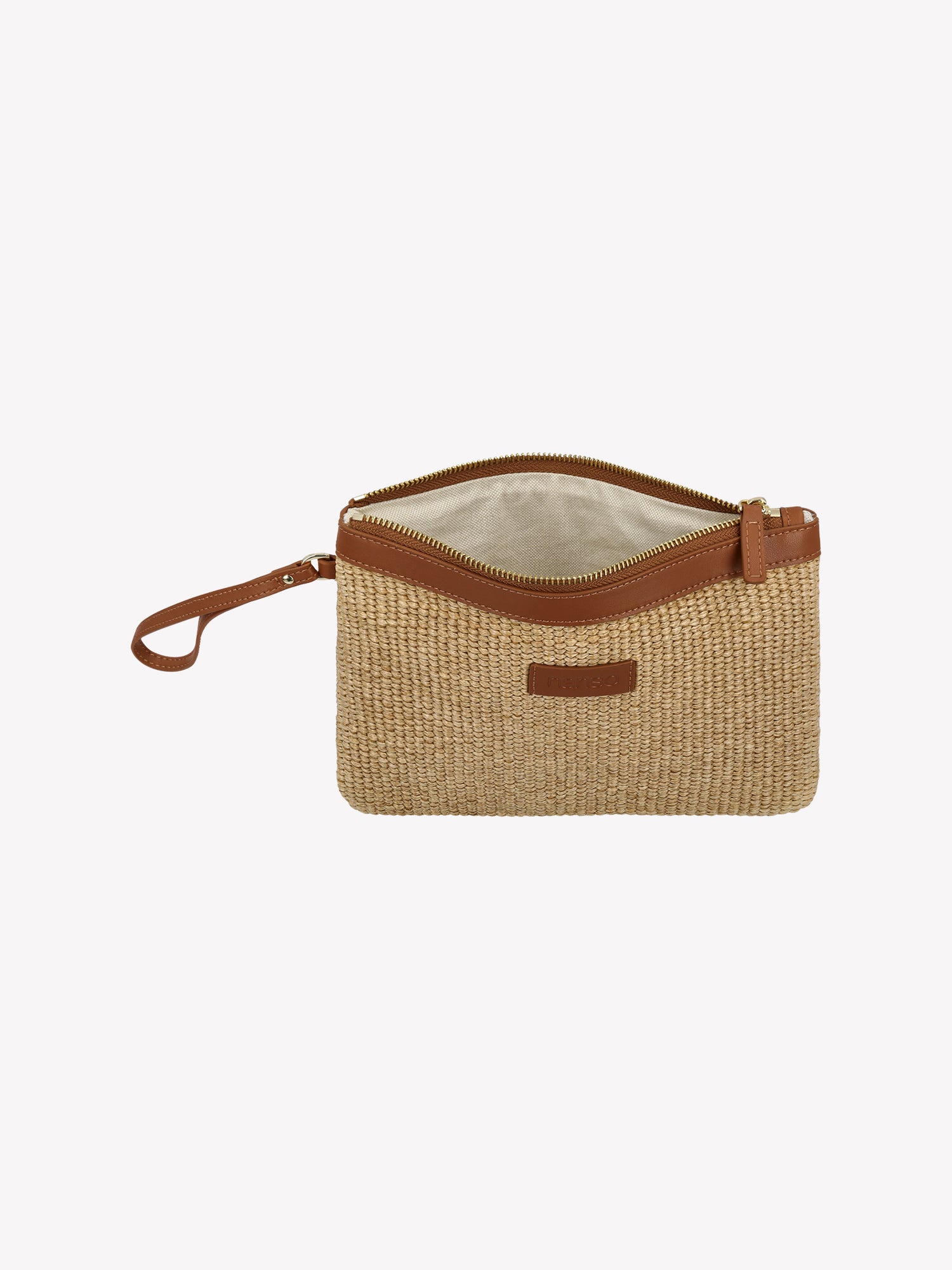 A stylish Kori bag in a compact size, crafted from durable straw-like material. This compact bag features a short leather handle and secure zip closure. Product picture from the front with the bag opened