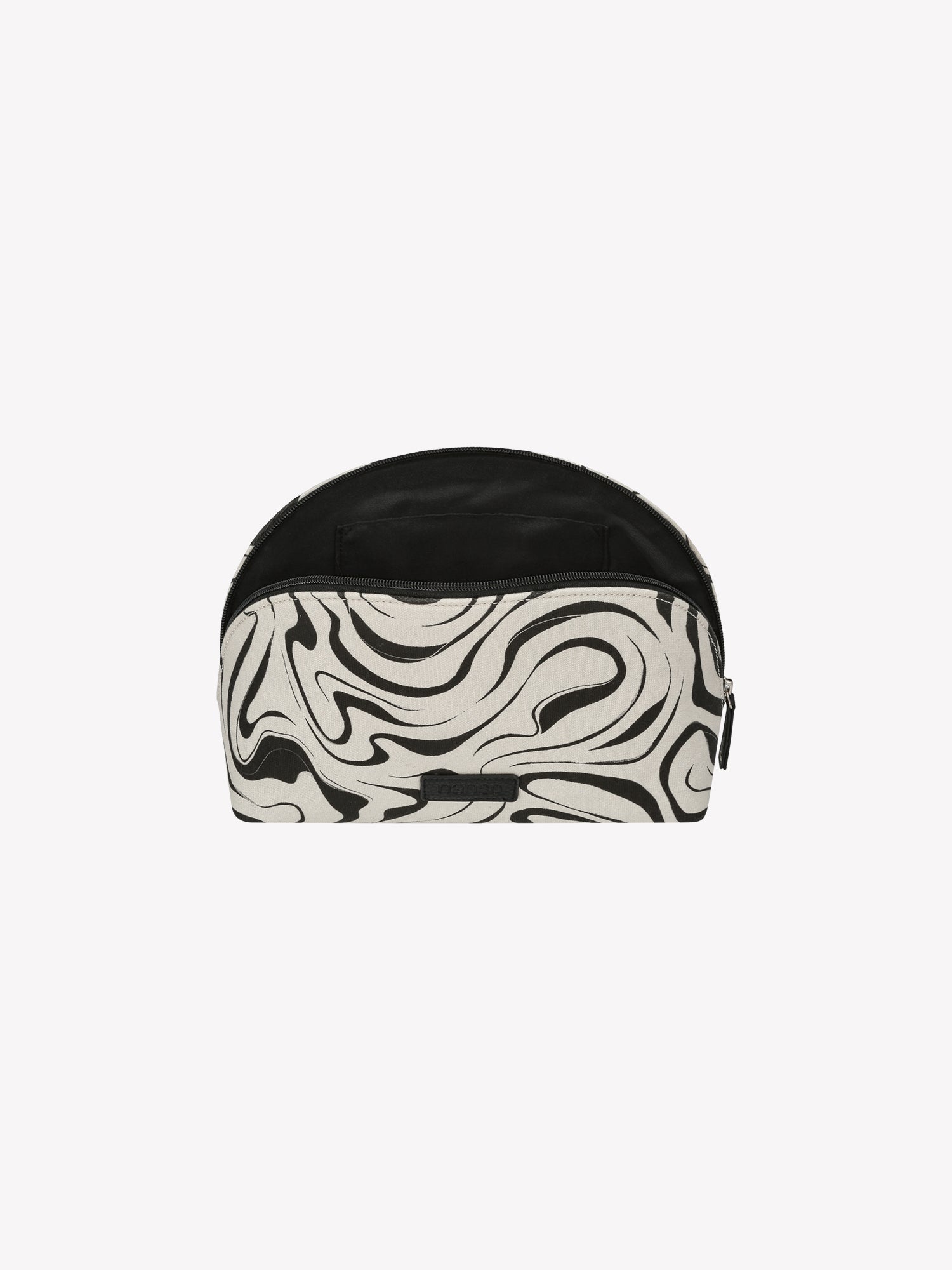 The VESI Cosmetics Bag in black and white in a product picture, zipper opened