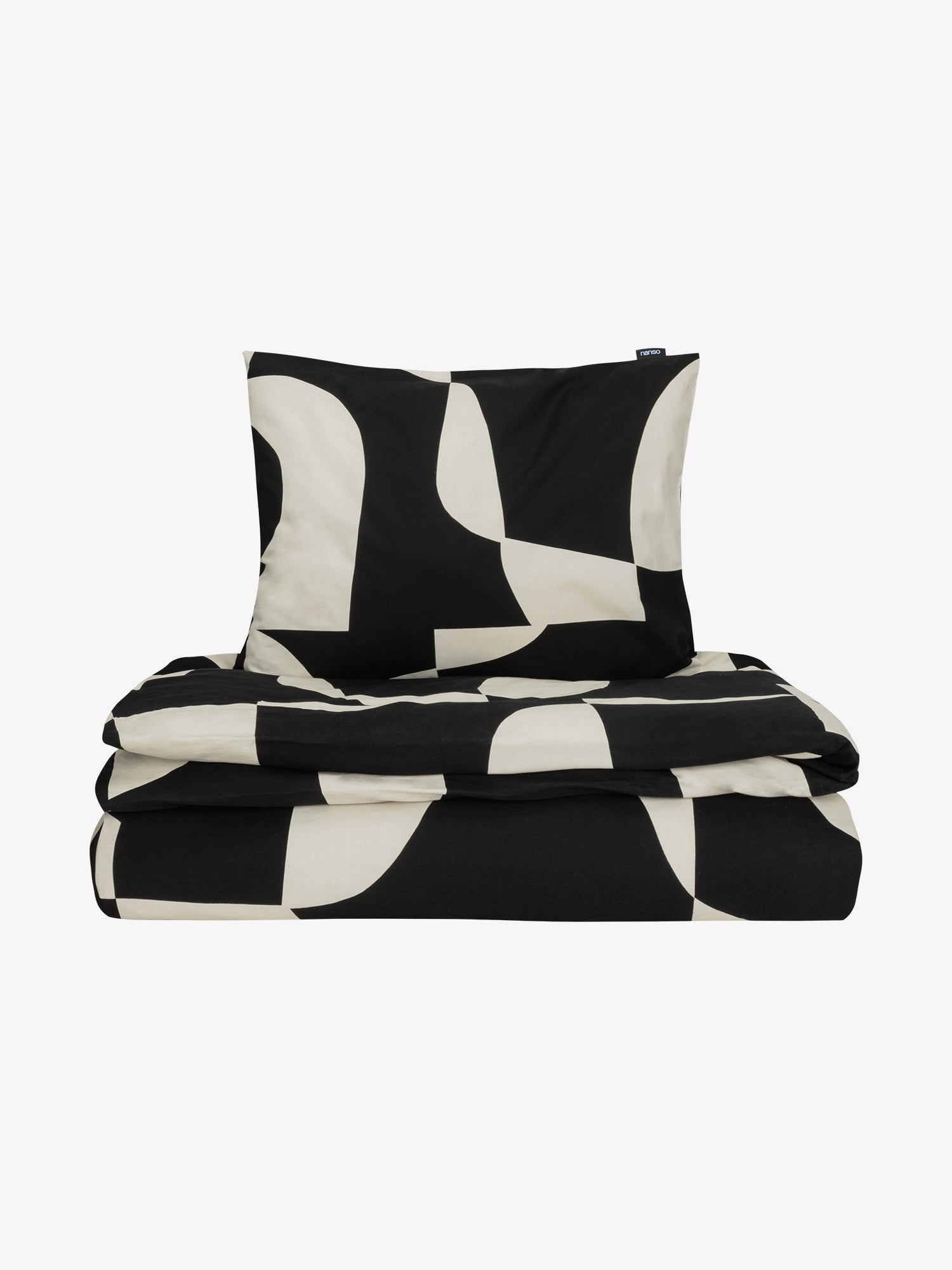 The Kallio Duvet Cover set brings understated elegance to your bedroom with its refined geometric pattern in soft beige and black tones, in a product picture