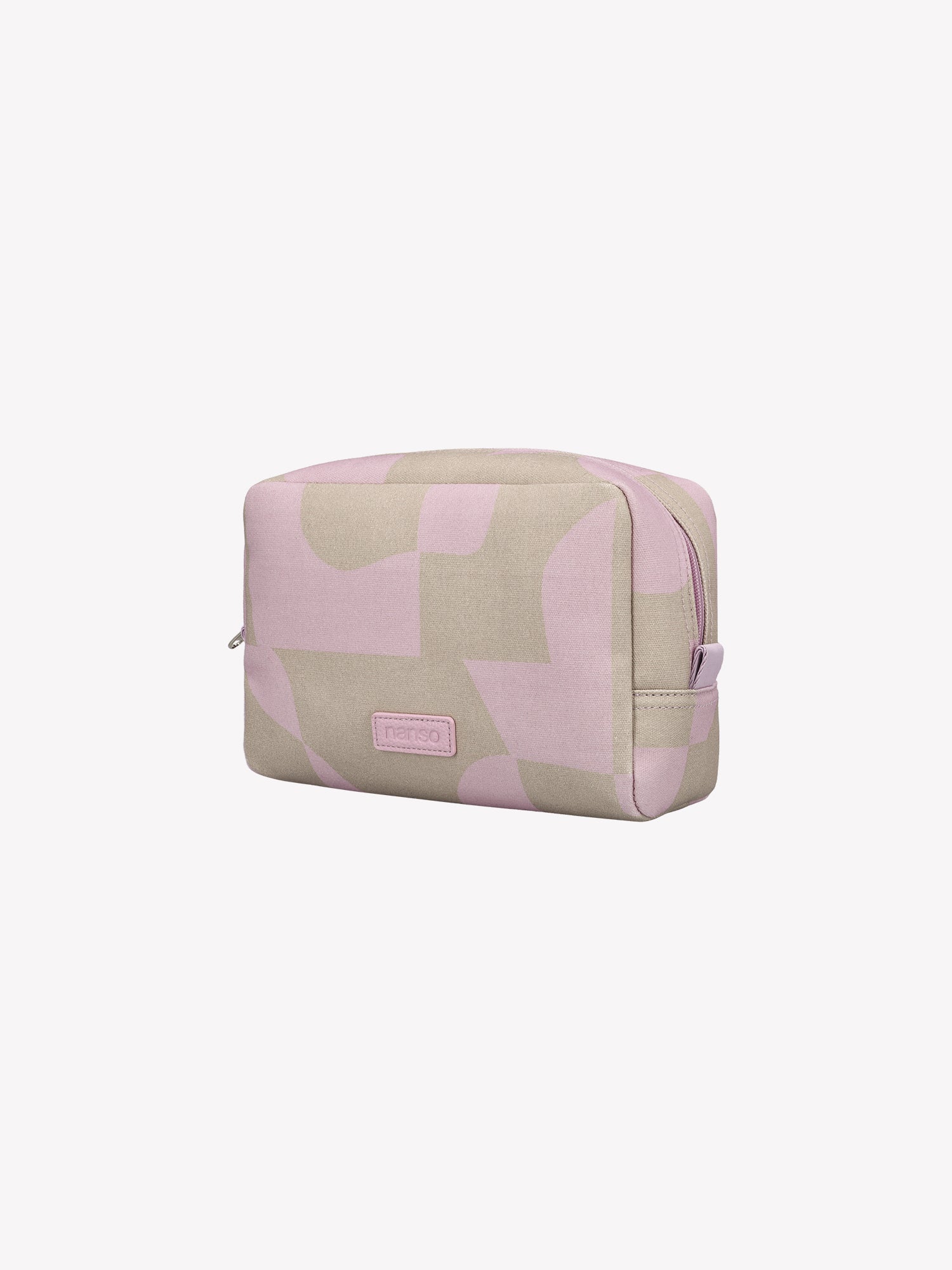 The KALLIO cosmetics bag features a stylish two-tone design that combines beige and pink hues. Product picture from the side angle.