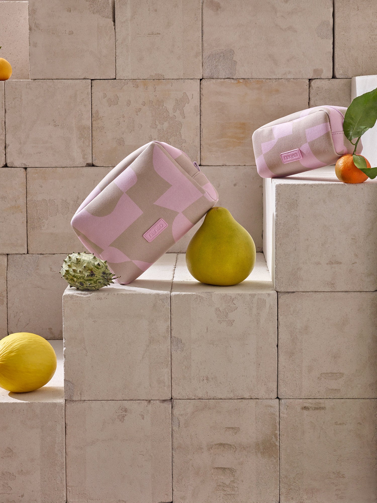 Kallio Cosmetics Bags in a beautiful composition with fruits.