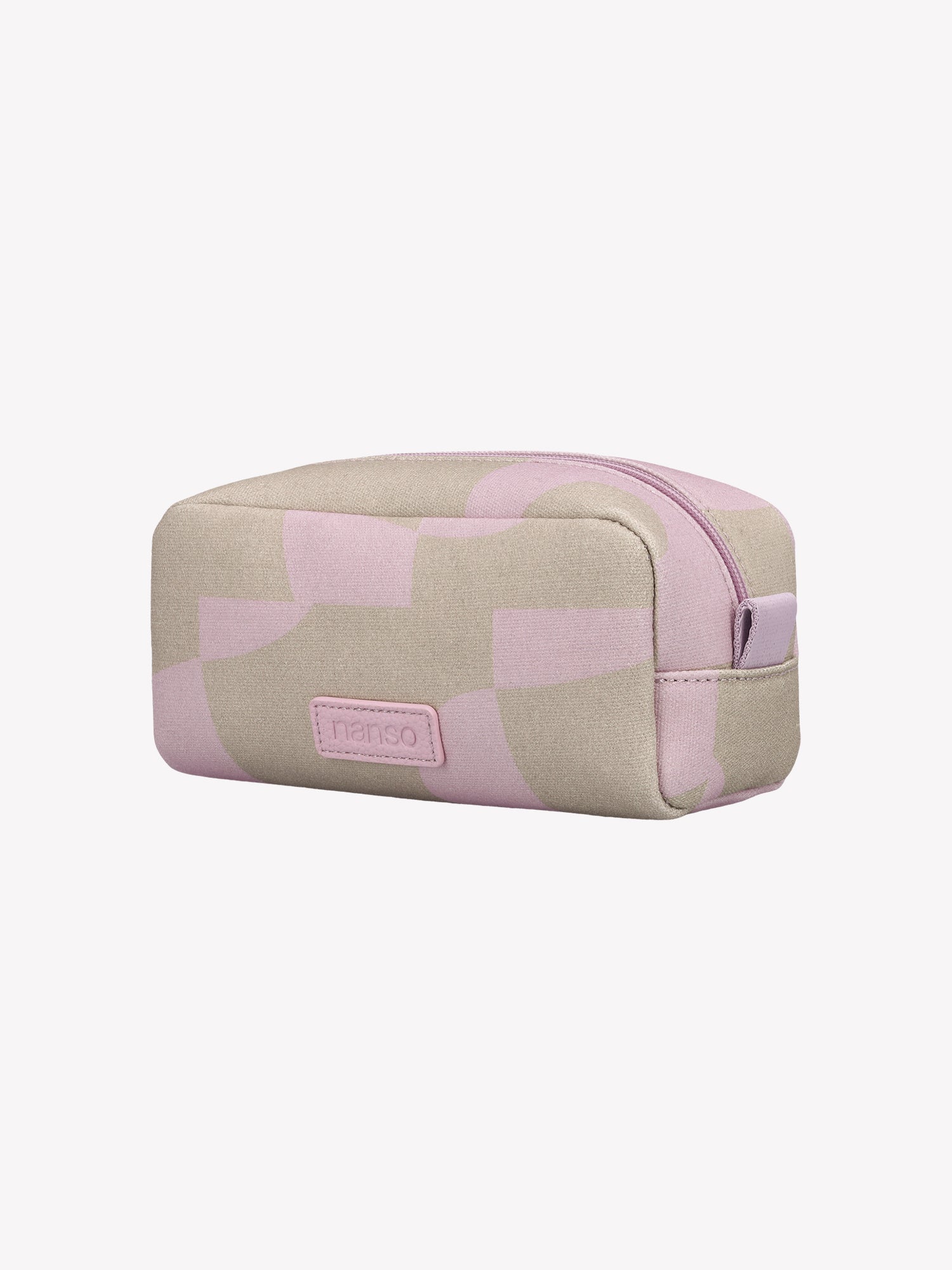 The KALLIO MINI patterned cosmetics bag in beige and pink in a product picture from the side angle