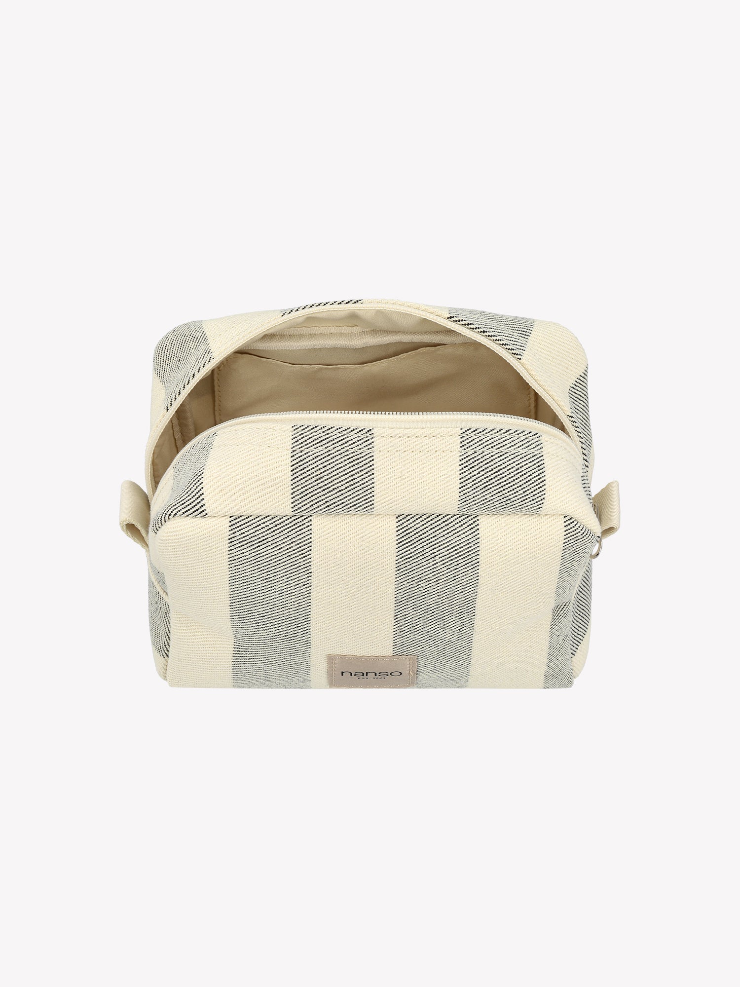 The AMALFI MINI cosmetics bag in Black and White in a product picture the zipper opened