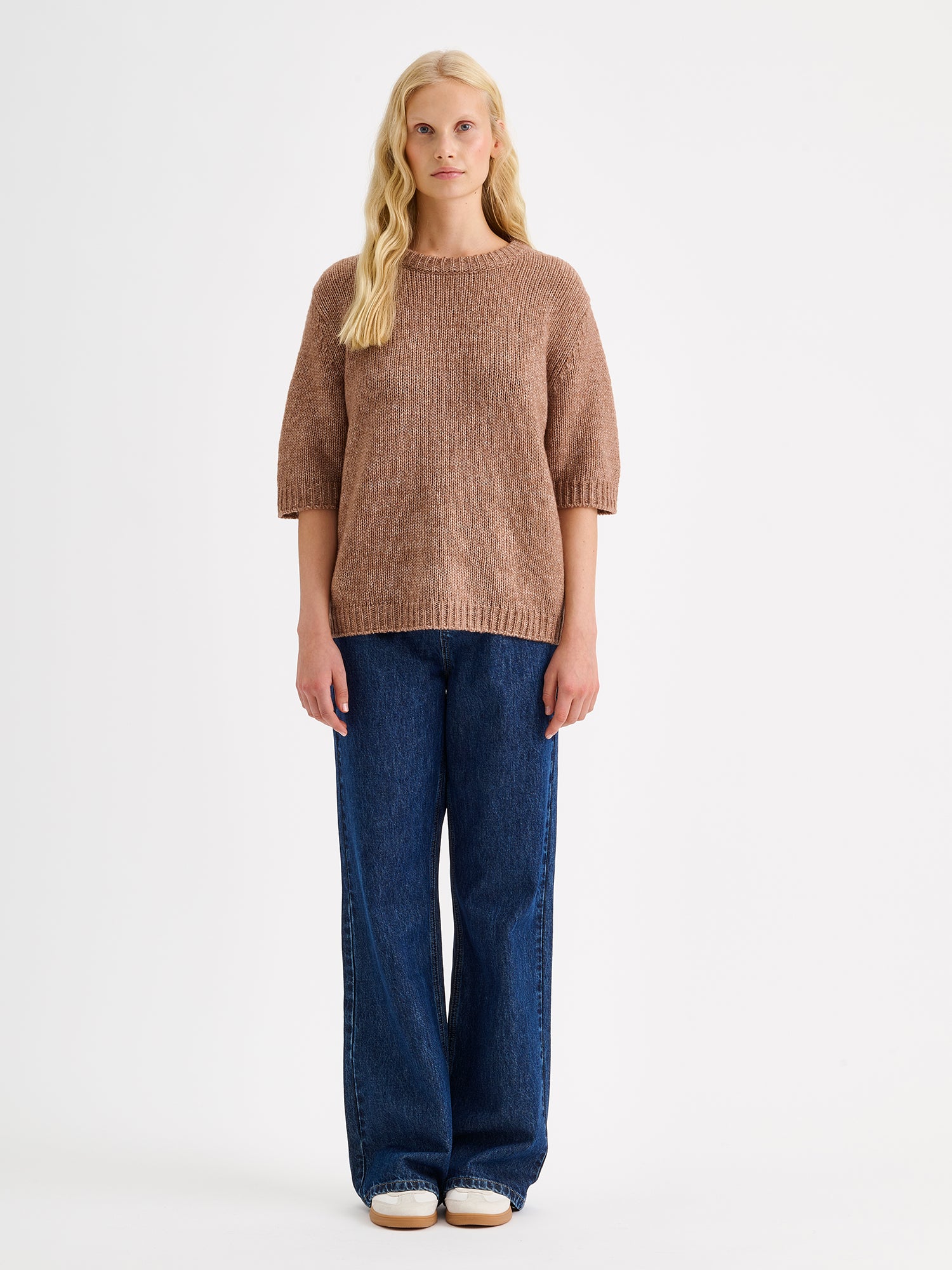 Nanso womens knit sweater Moriko in warm brown, on a model with jeans 