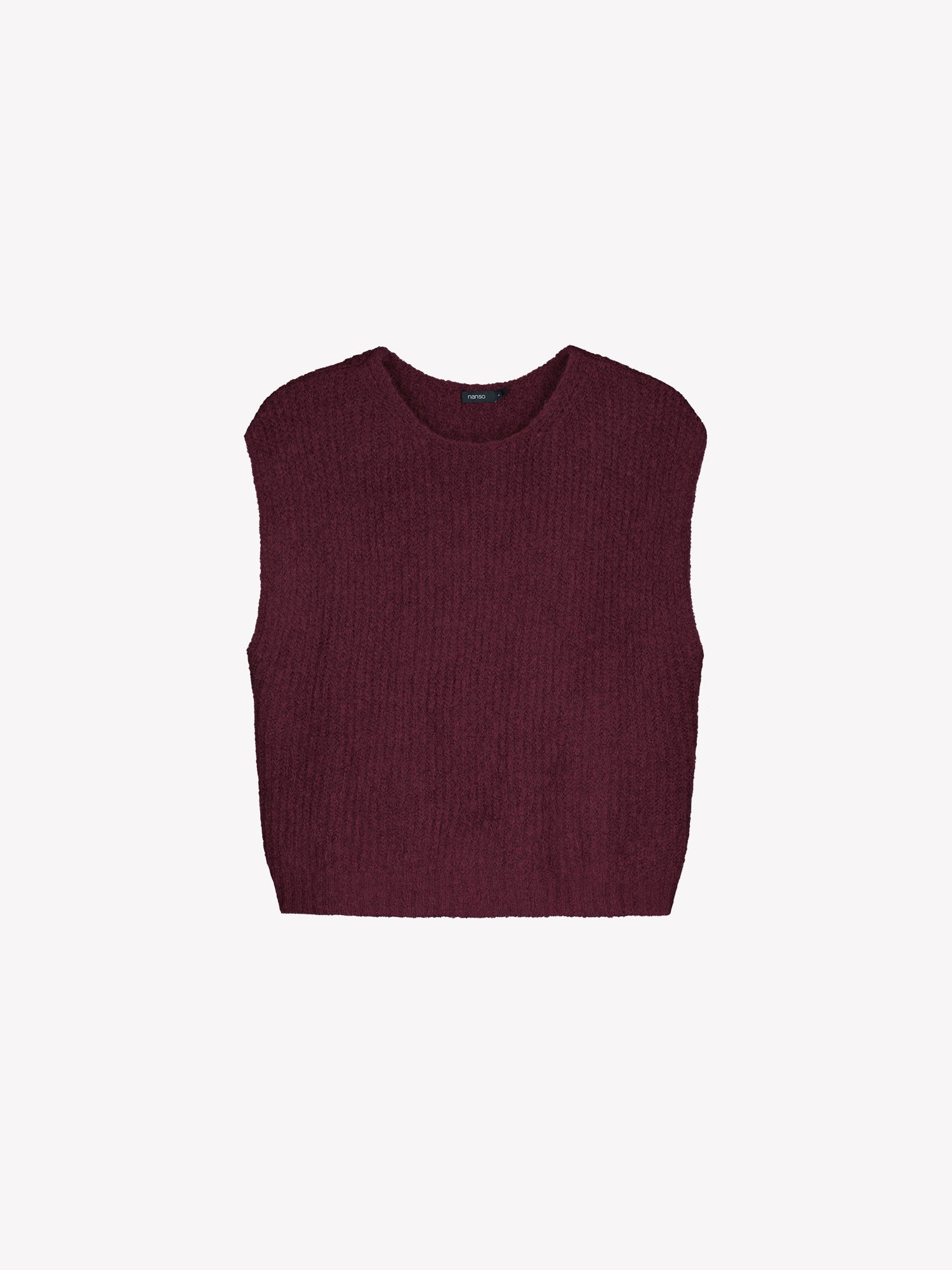 Nanso women's luxuriously soft and wonderfully chunky, the Karamelli knitted vest in a rich wine-red hue in a product picture.
