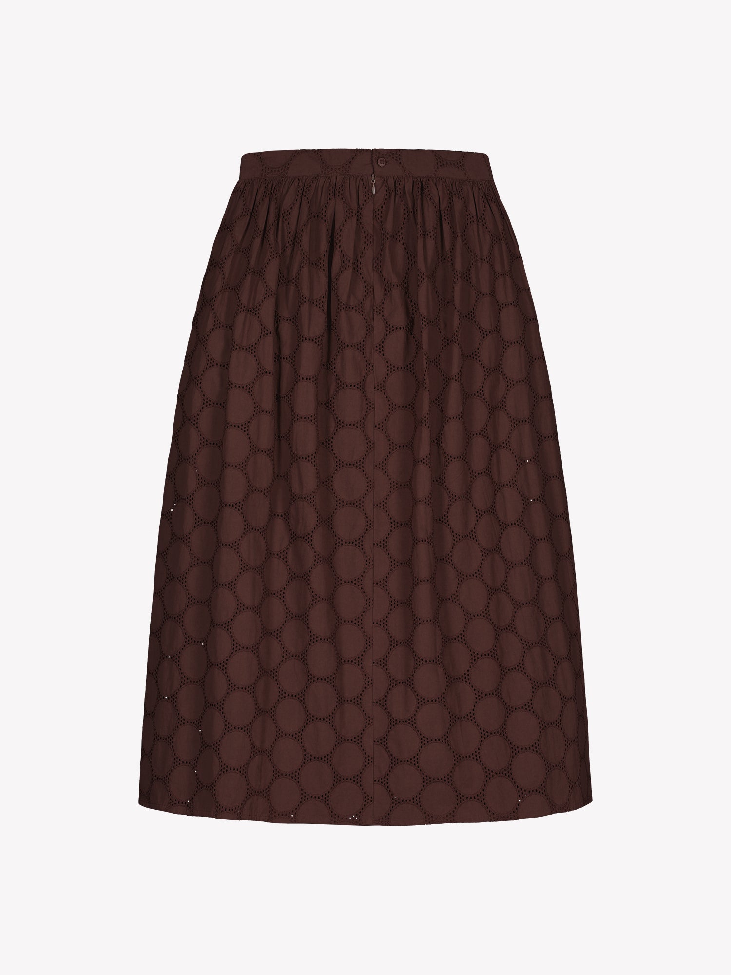 Nanso women's dark brown Siiri midi skirt, featuring a delicate lace-like woven cotton fabric with beautiful texture, pockets and a zip, in a product picture from the backside
