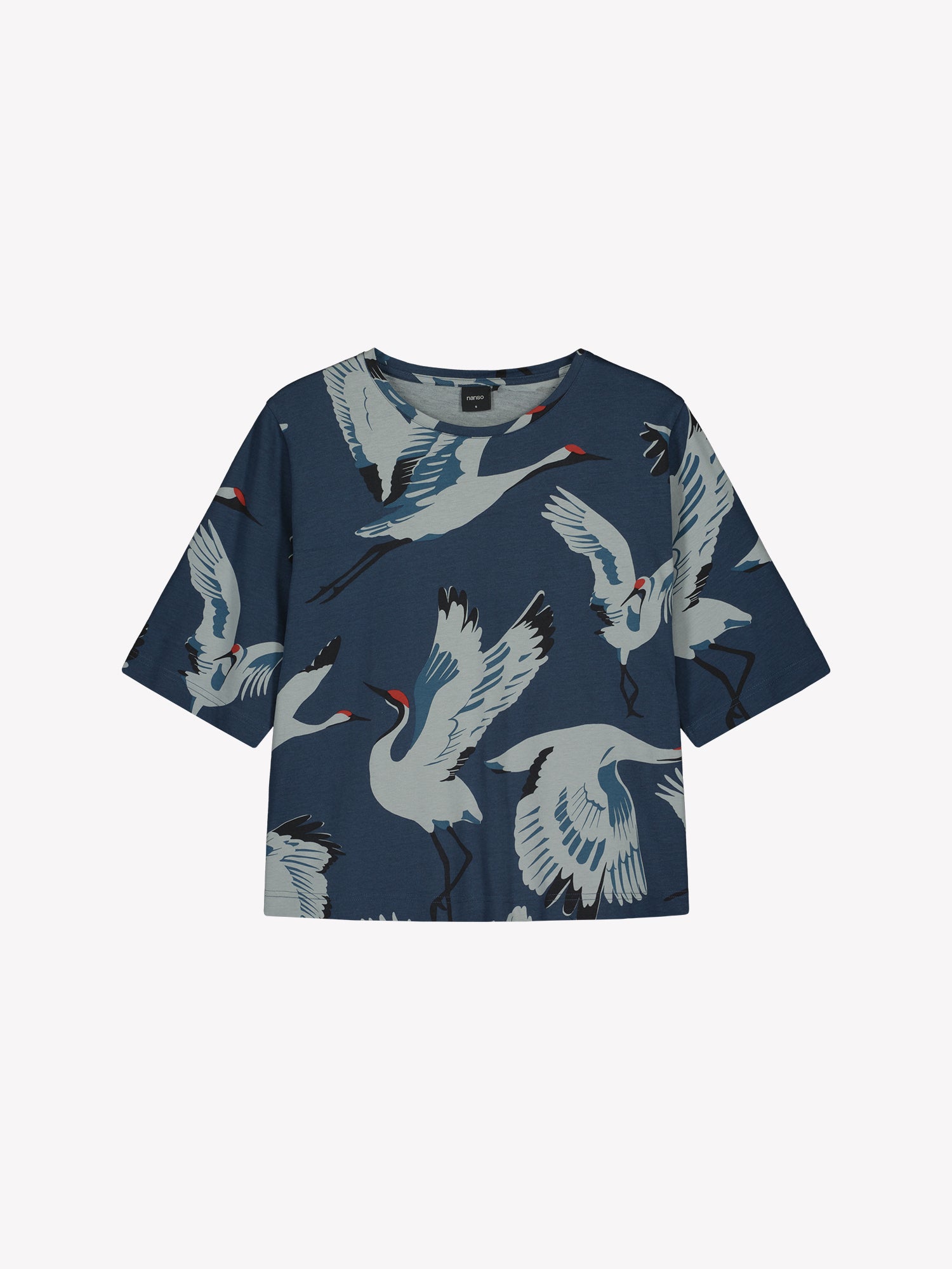 Nanso women's relaxed and straight-cut women's loungewear t-shirt featuring a charming Kurki pattern in elegant blue in a product picture