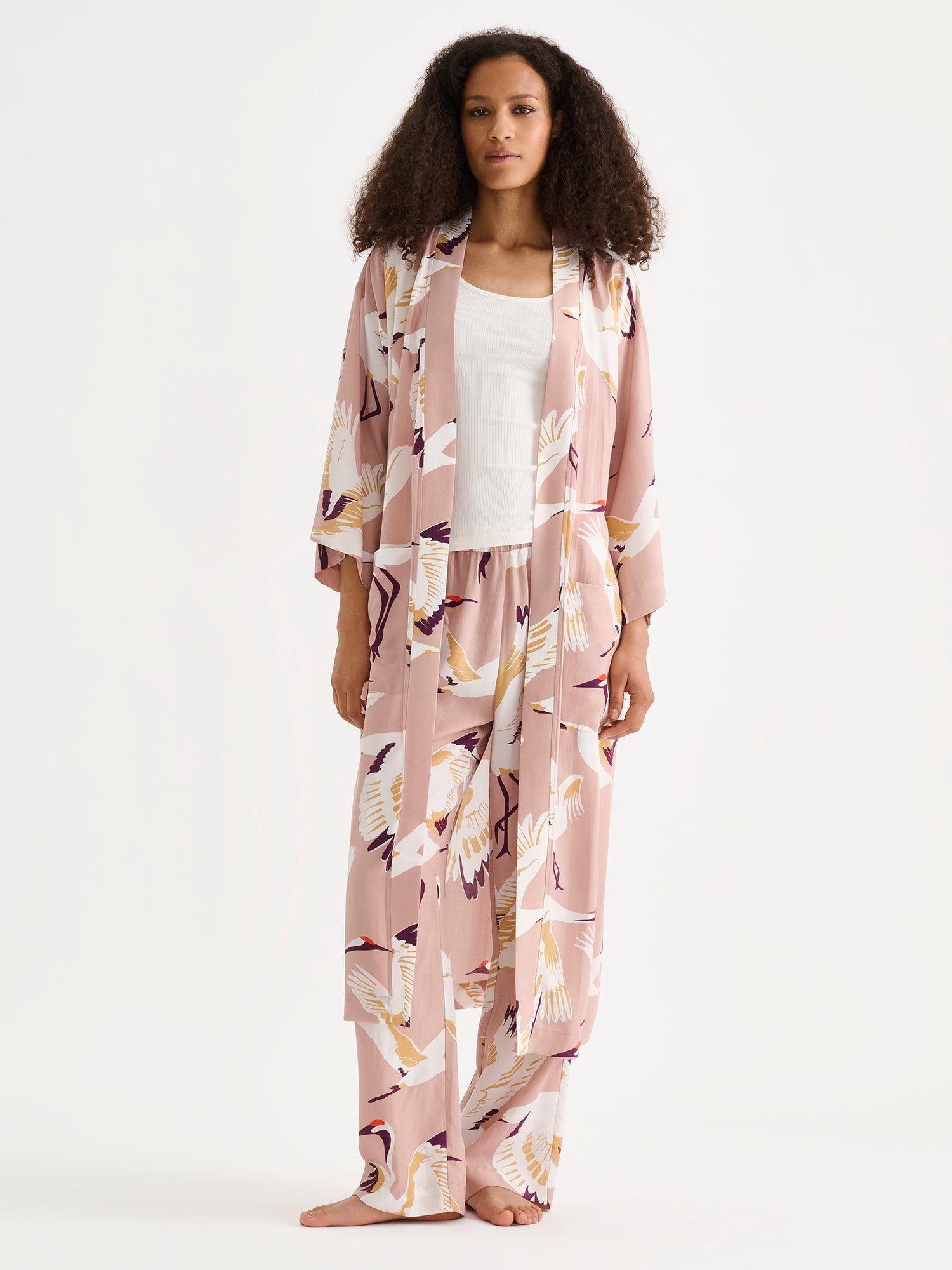 Nanso women's beautiful and comfortable KURKI robe featuring a striking and charming pale pink pattern, on a model