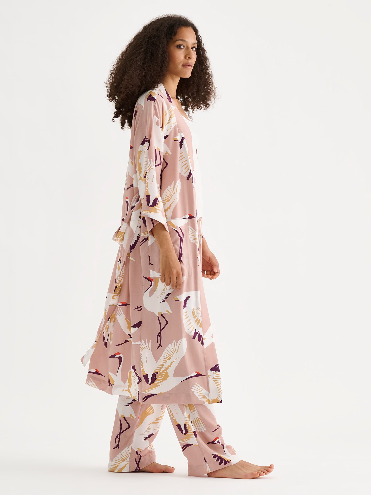 Nanso women's beautiful and comfortable KURKI robe featuring a striking and charming pale pink pattern, on a model