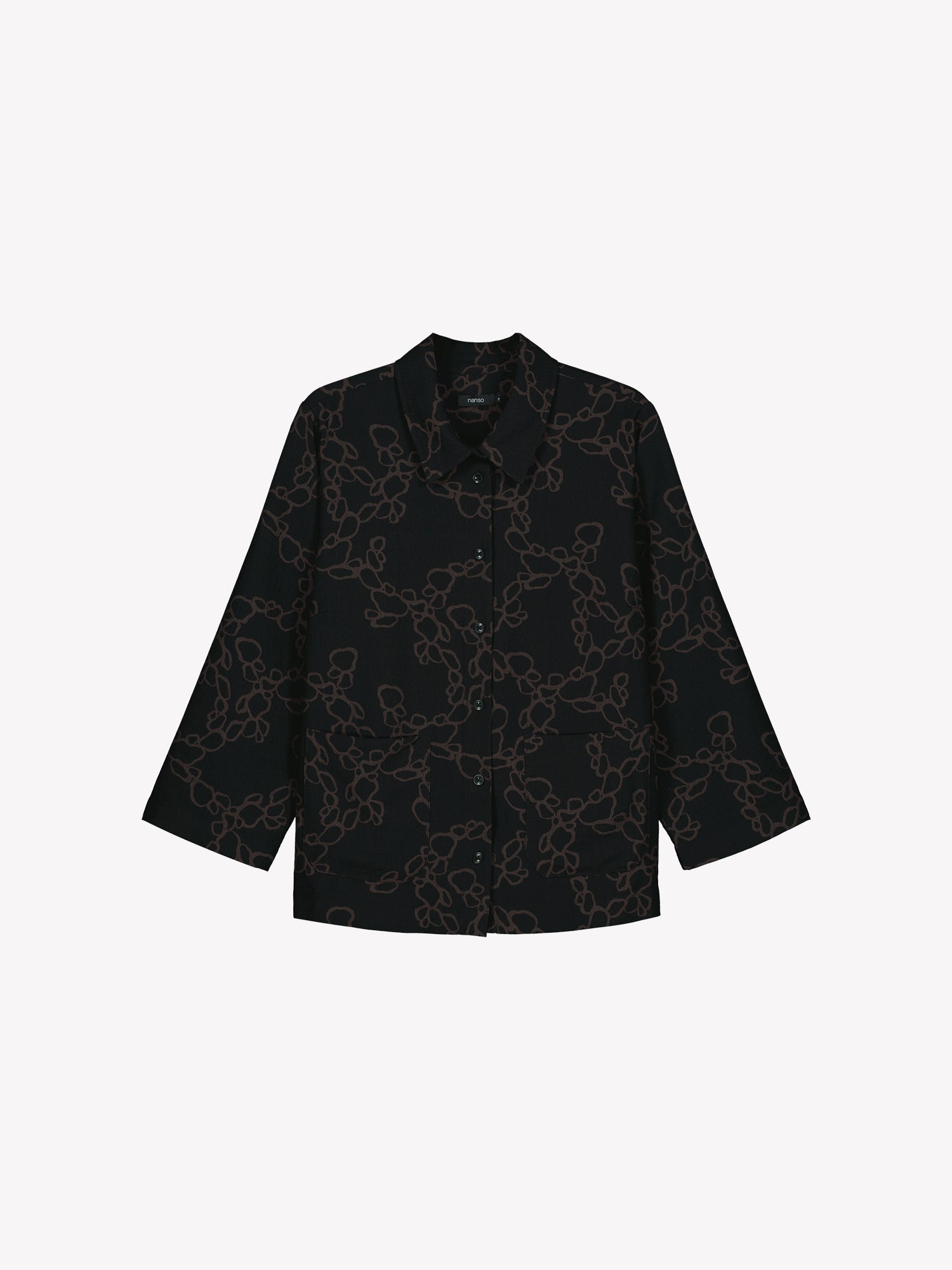 Women's patterned black and brown KIDE shirt in a product picture