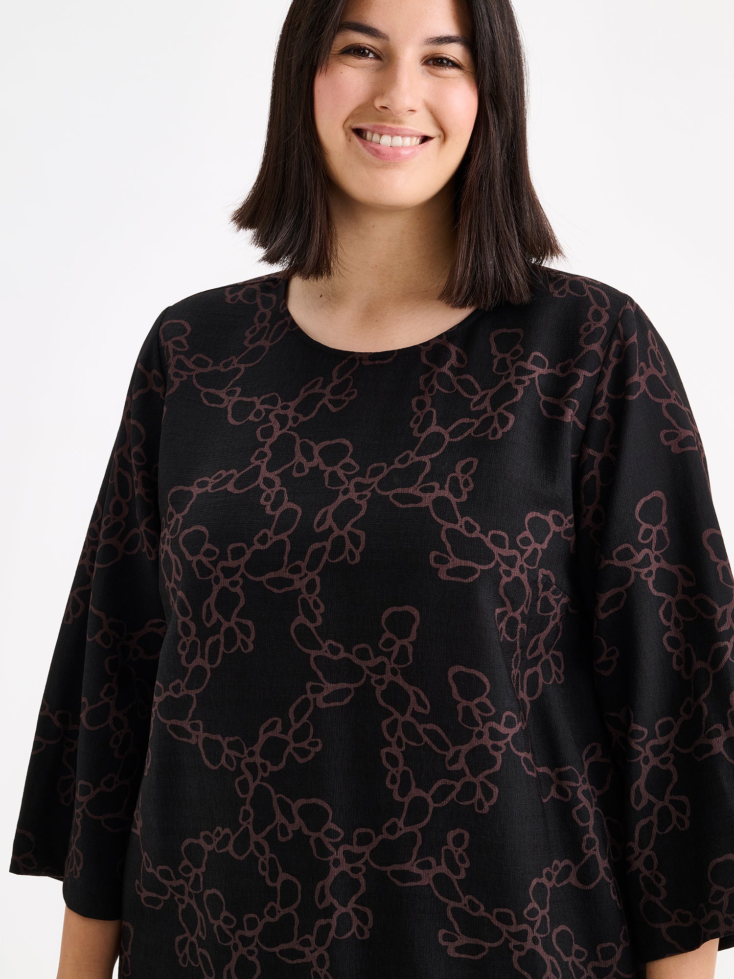 Nanso womens straight-cut woven dress for women featuring a harmonious and elegant black-brown pattern on a model