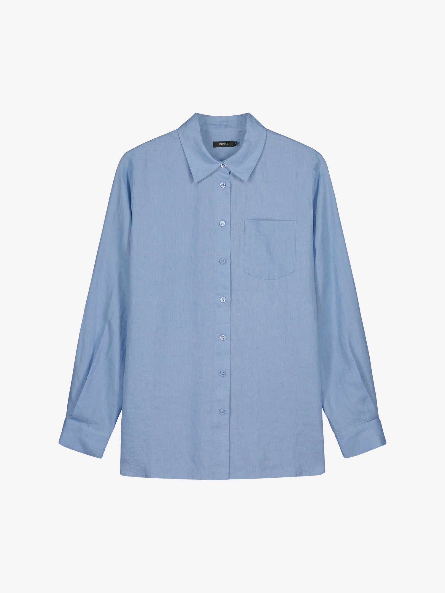 Nanso women's relaxed, classic and versatile light blue Lene linen shirt is crafted from woven linen fabric that is durable and breathable. The shirt features a front button closure and chest pocket and full-length sleeves. In a product picture
