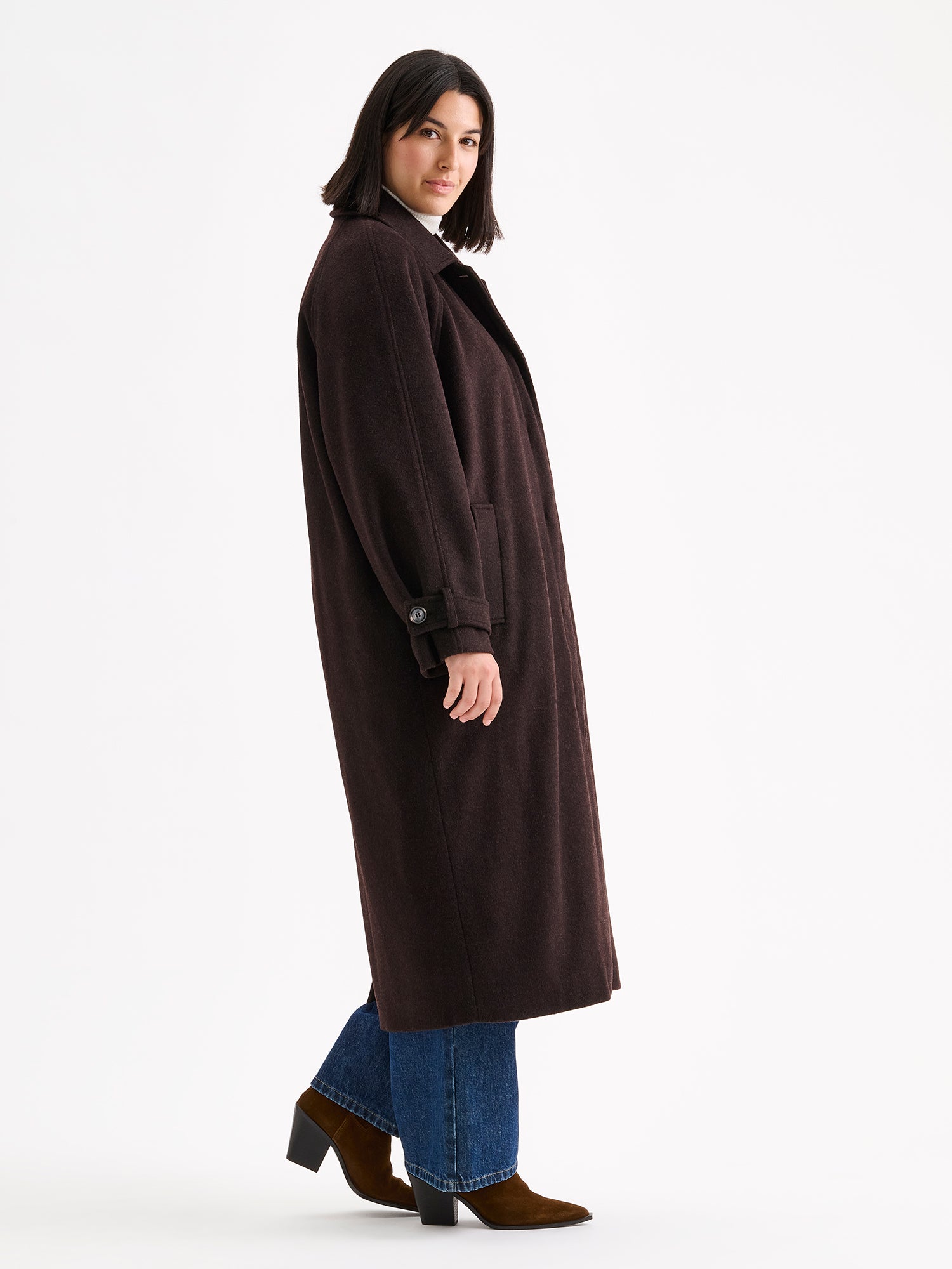 Nanso women's timelessly elegant and effortlessly classic, the Tove long wool coat, on a model with blue jeans