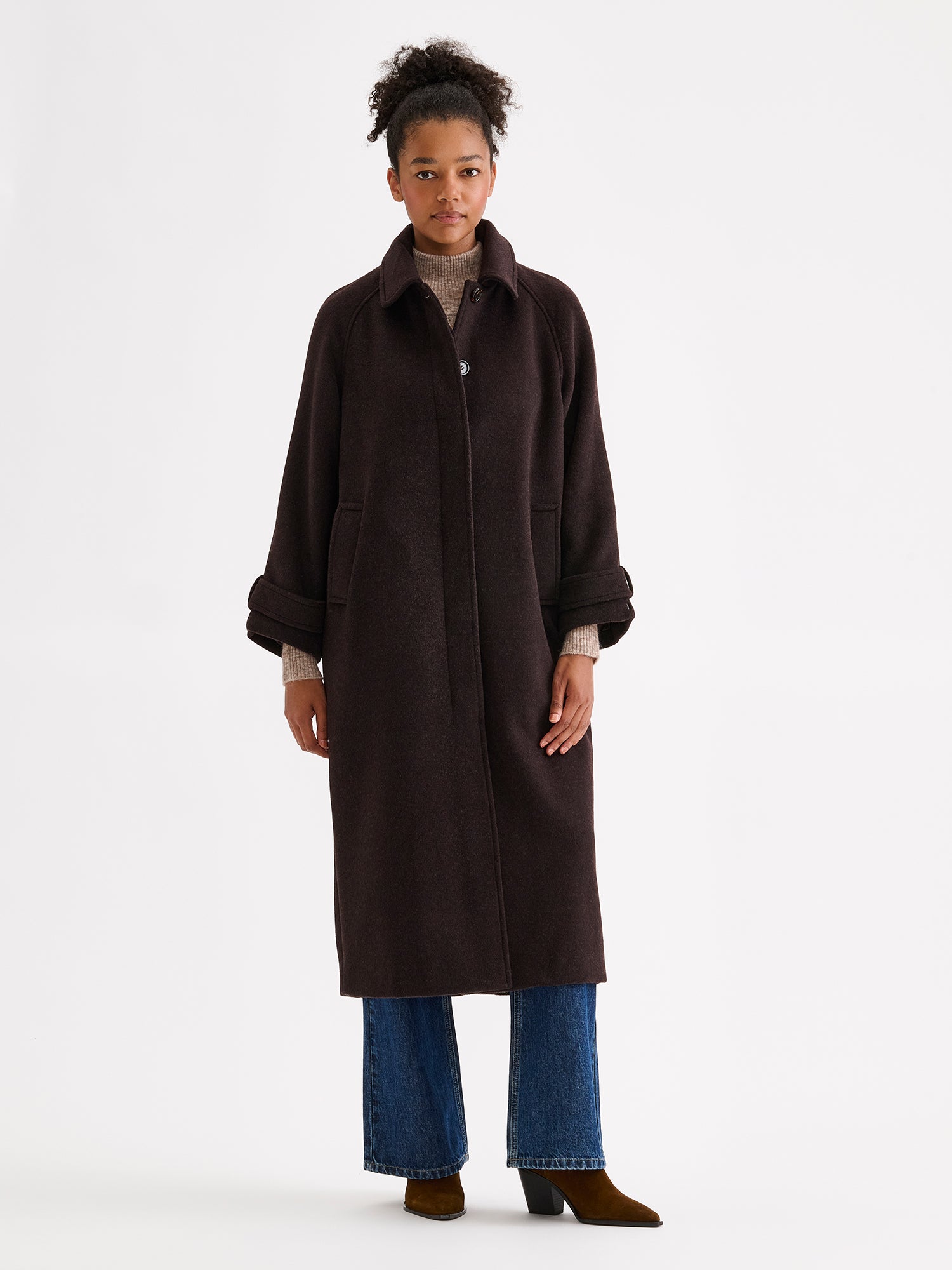 Nanso women's timelessly elegant and effortlessly classic, the Tove long wool coat, on a model with blue jeans