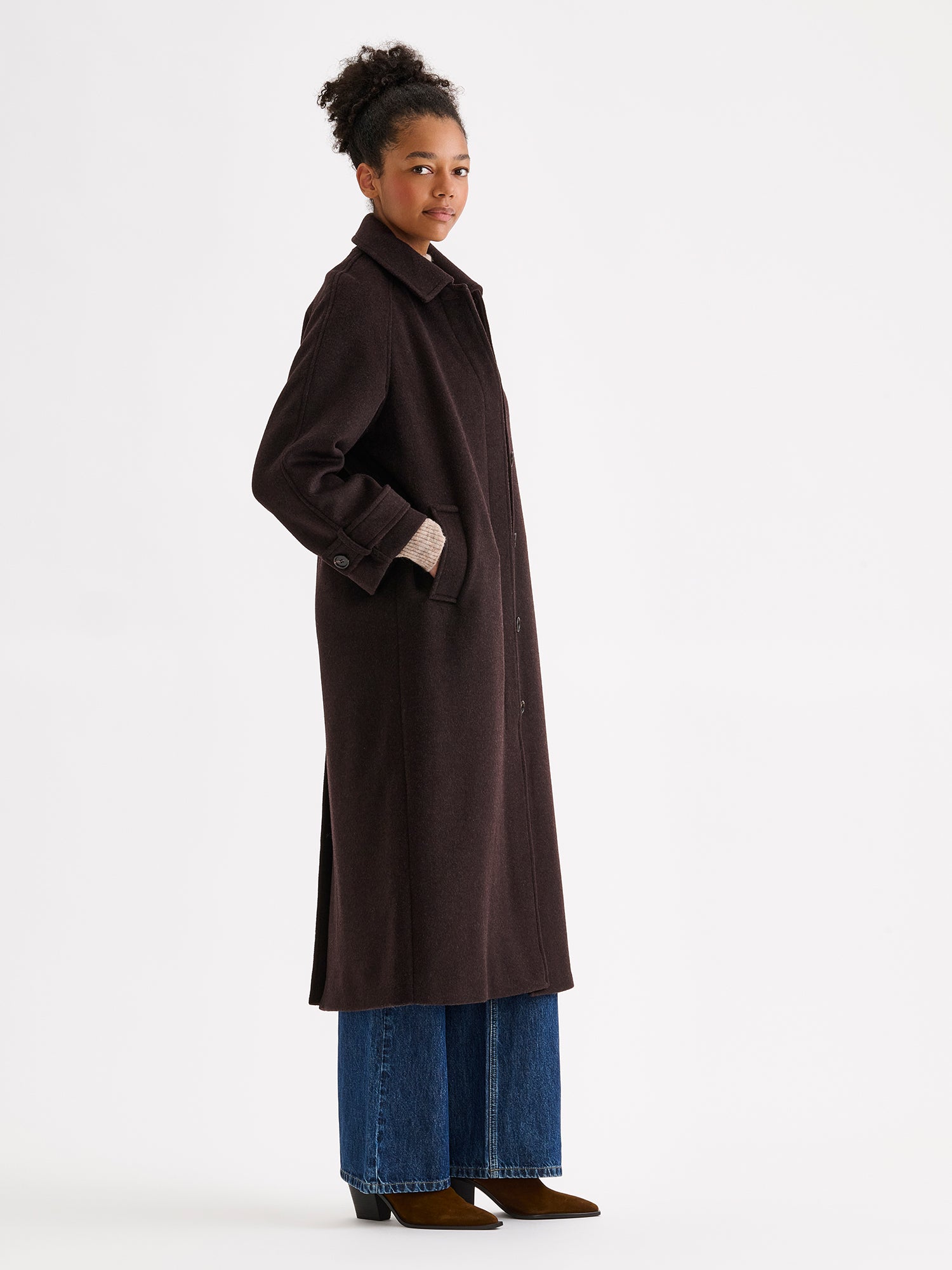 Nanso women's timelessly elegant and effortlessly classic, the Tove long wool coat, on a model with blue jeans