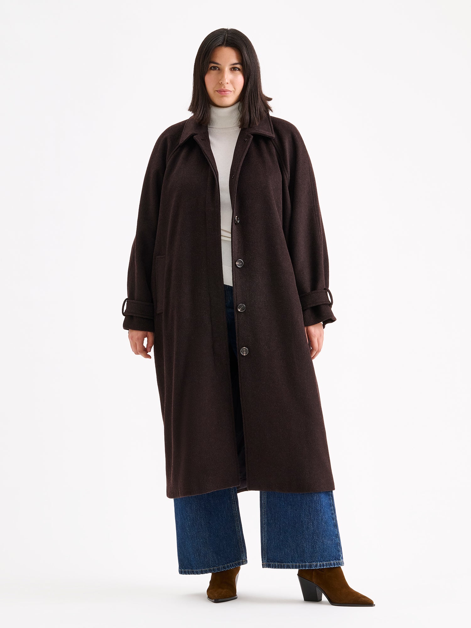 Nanso women's timelessly elegant and effortlessly classic, the Tove long wool coat, on a model with blue jeans