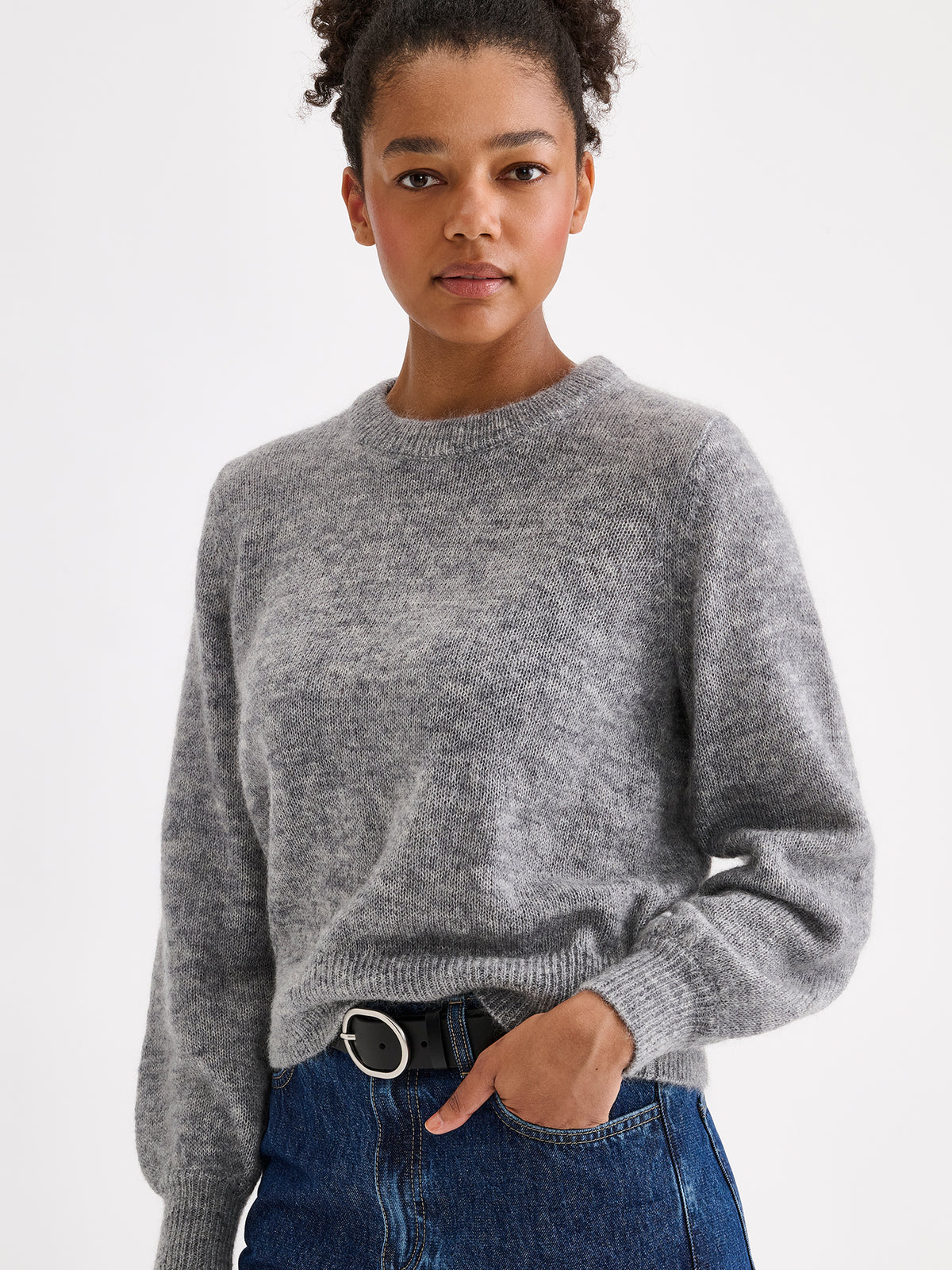 Nanso women's Lotte knitted sweater in a timeless grey shade on a model with jeans | S - 177cm