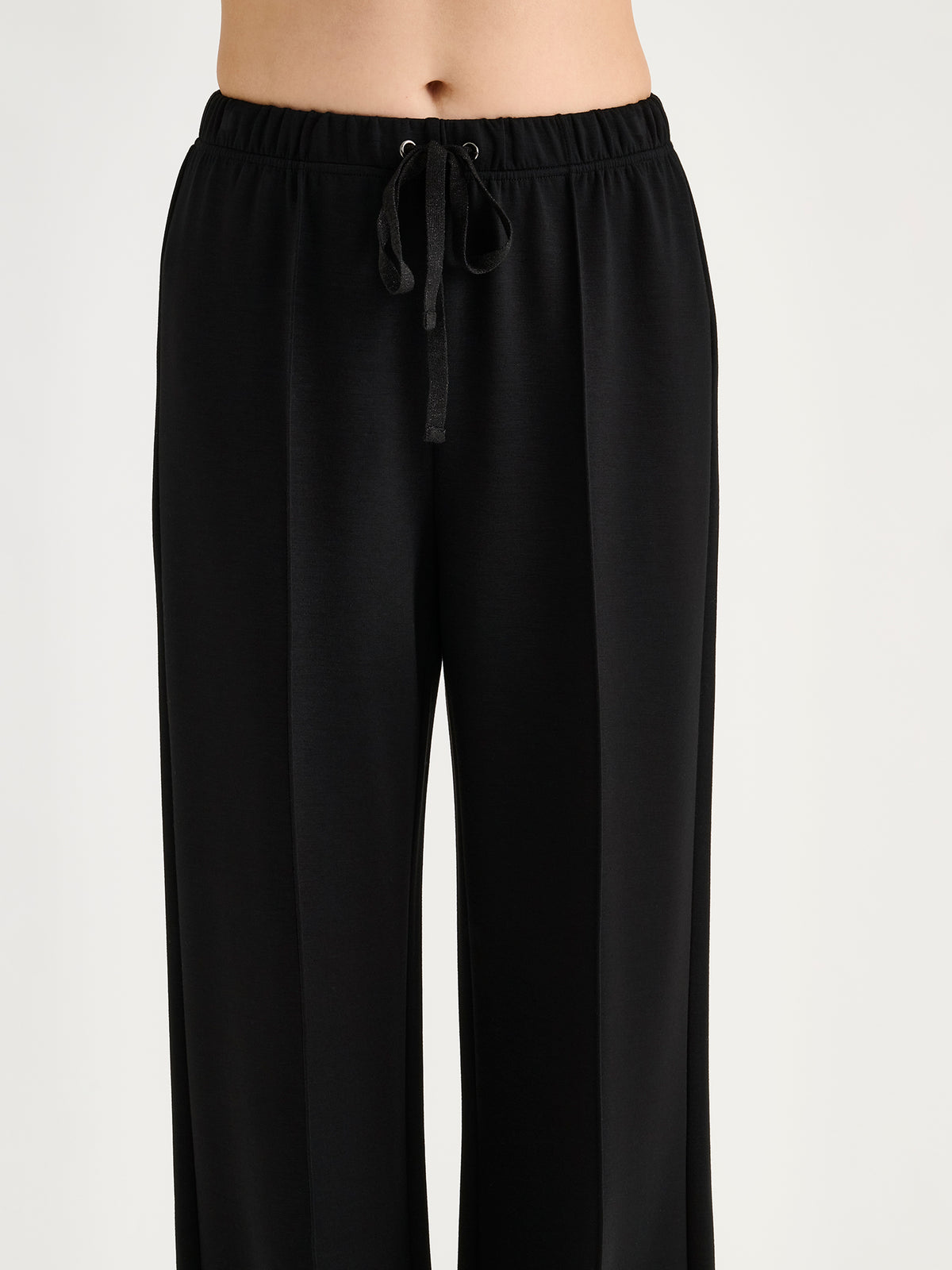 Nanso women's elegant black Aurelia lounge pants with wide legs combine comfort with a polished look. 