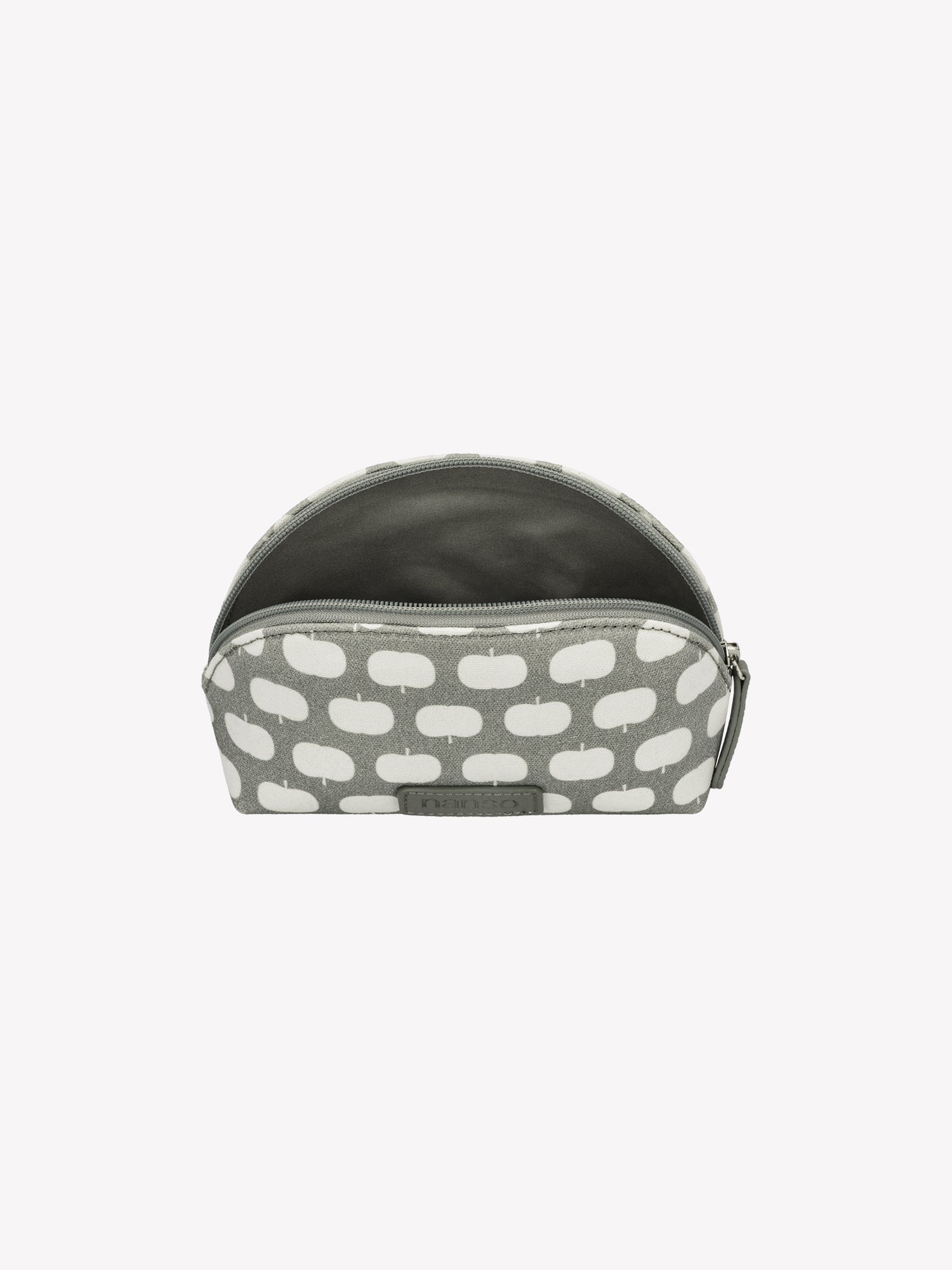 Nanso's Omppu mini cosmetics bag in Green features a charming apple pattern. In a product picture