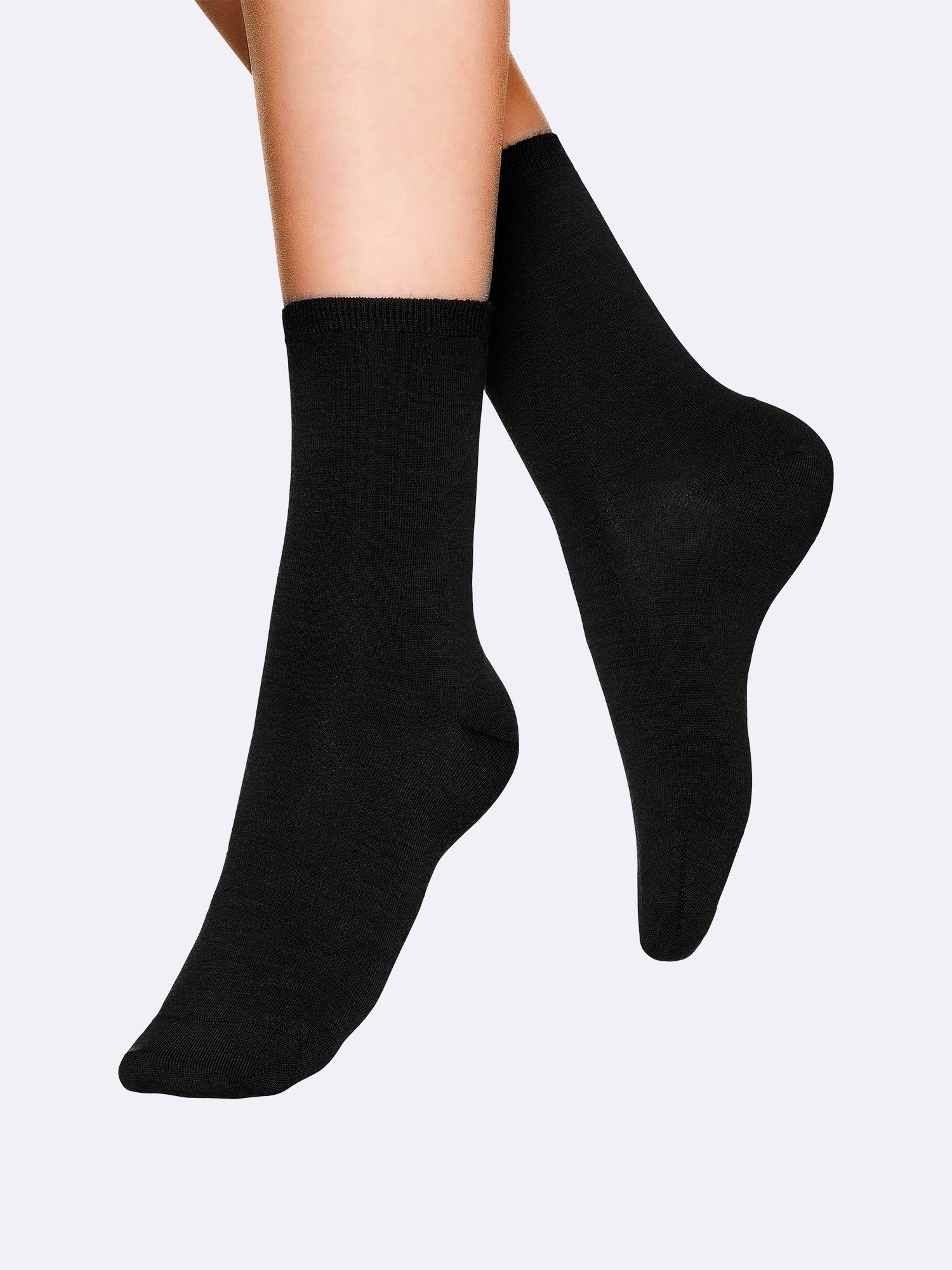 Vogue women's Merino Wool socks crafted from premium merino wool, on a model, close-up.