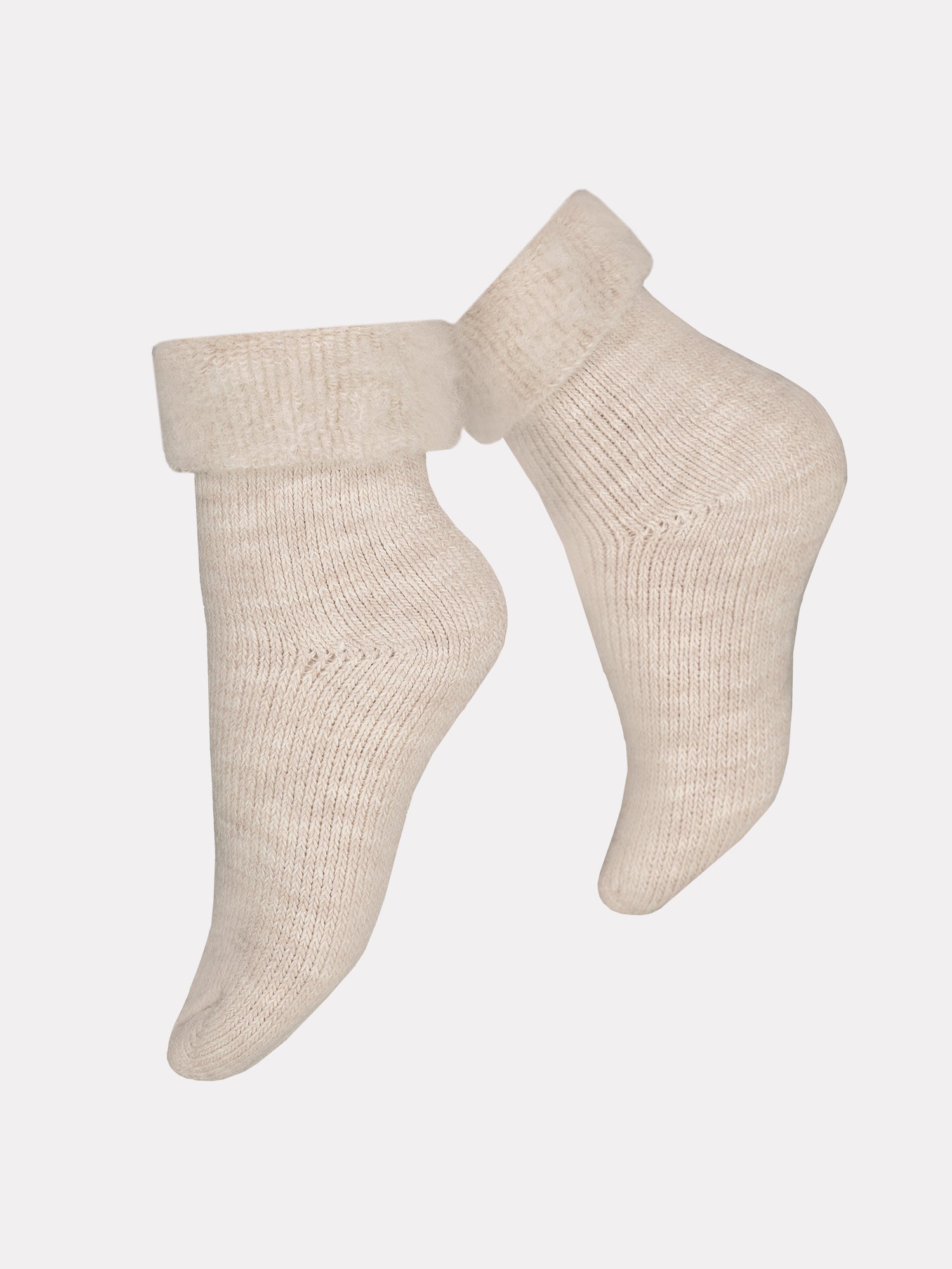 Vogue's Softies ankle socks in melange grey from wool blend in a product picture. They have fur inside.