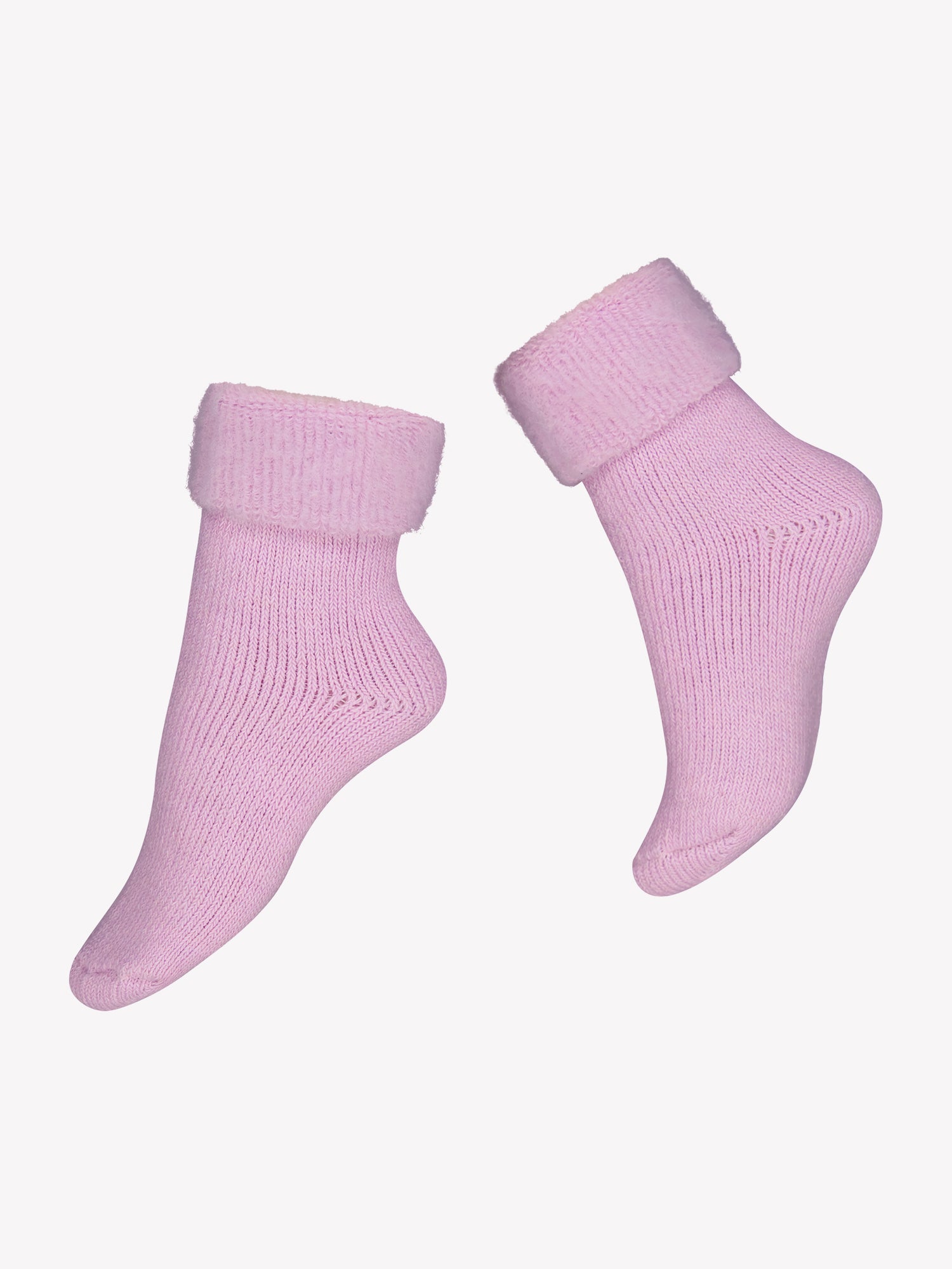 Vogue's rose Softies ankle socks from wool blend in a product picture. They have fur inside.