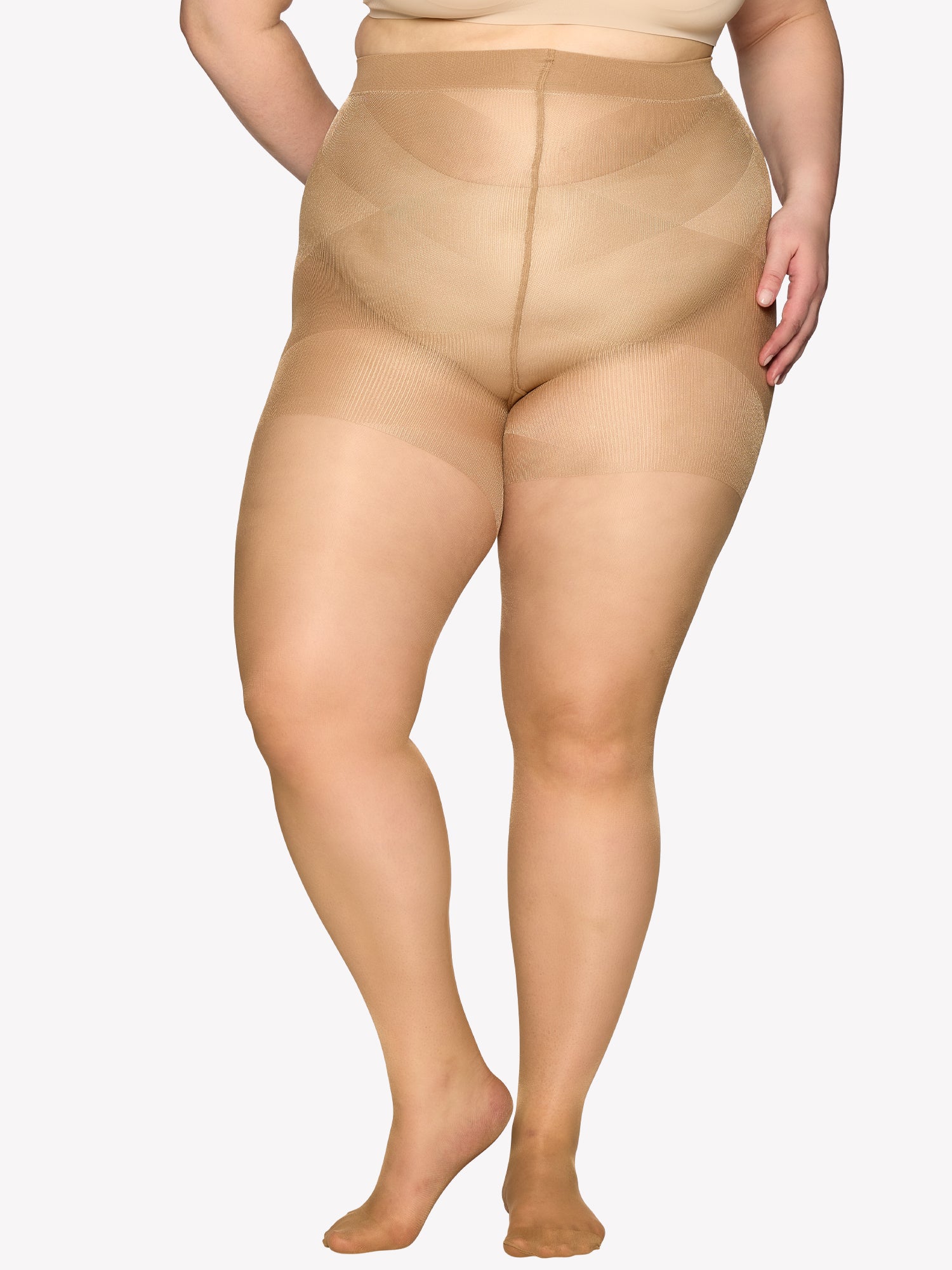Vogue women's Curvy 40 denier sheer semi-matte tights, expertly crafted for curvy figures with elastic waistband  and a light panty part without panel gusset. On a plus size model.