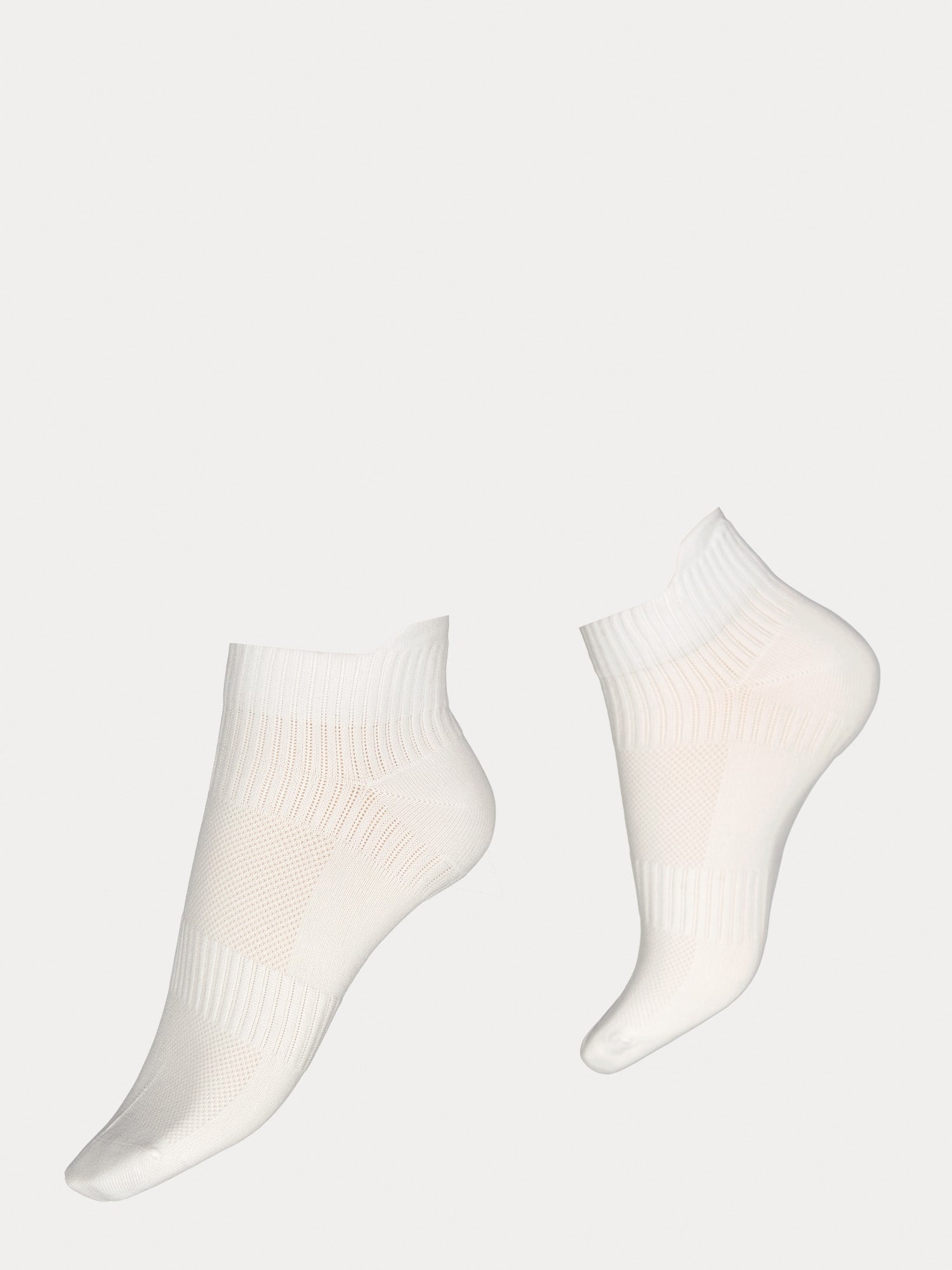 Vogue women's Sport Sneaker socks two-pack combines a black and white pair crafted from polyamide with elastane stretch for all-day comfort, product picture of the white socks.