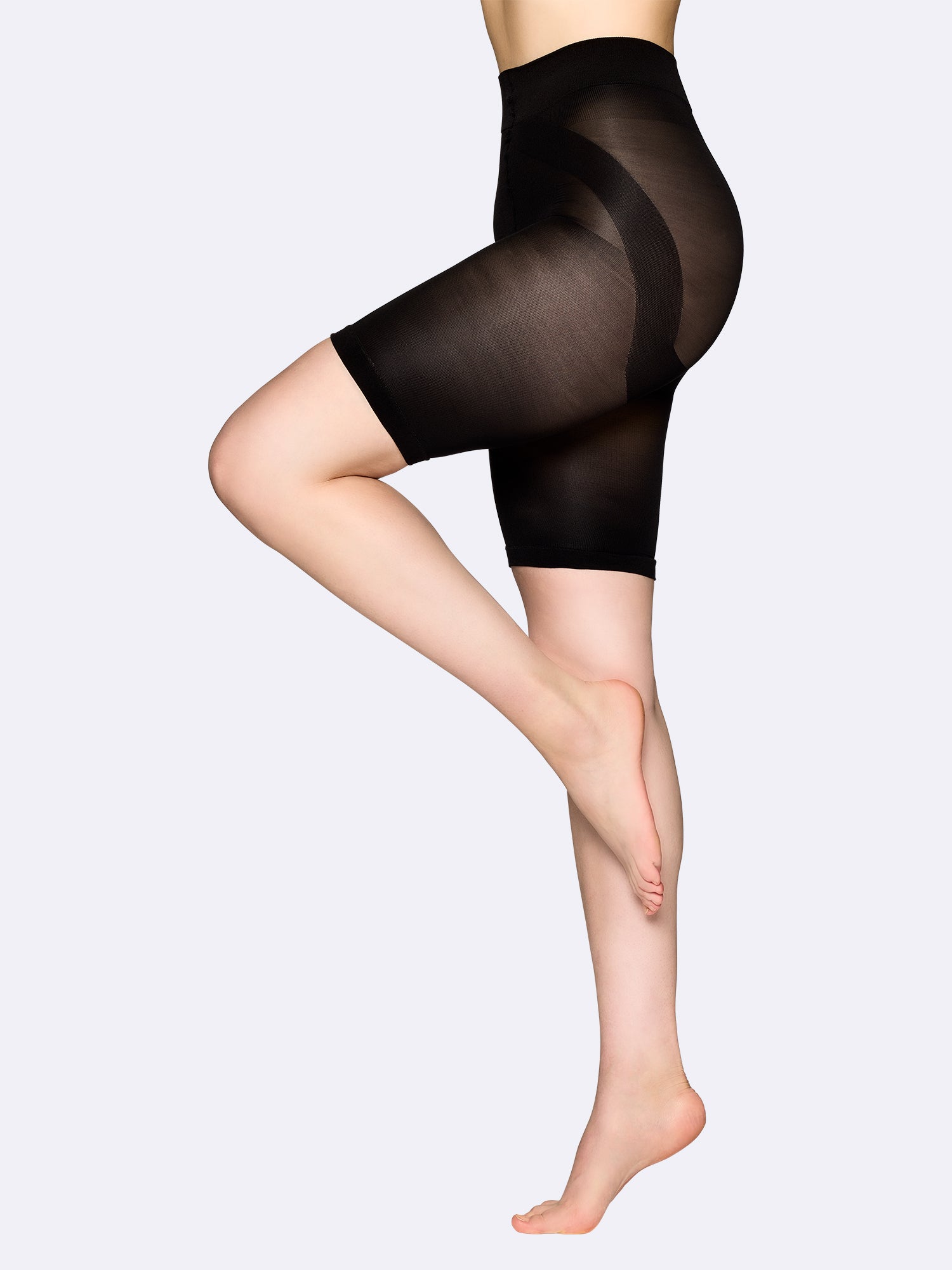 Vogue's comfortable short leggings with a moderately shaping waistband on the model.