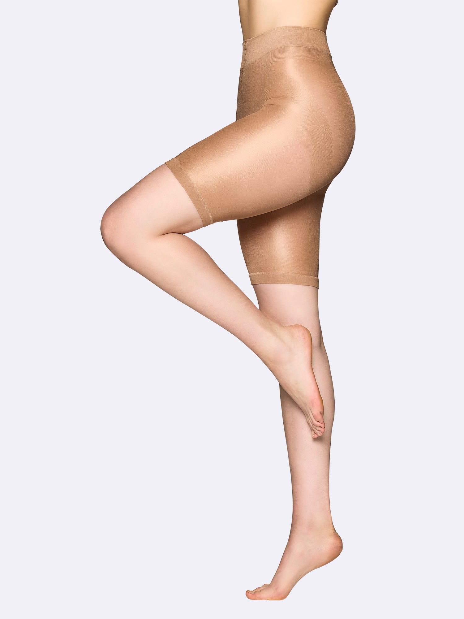 Vogue's comfortable short leggings with a moderately shaping waistband on the model.