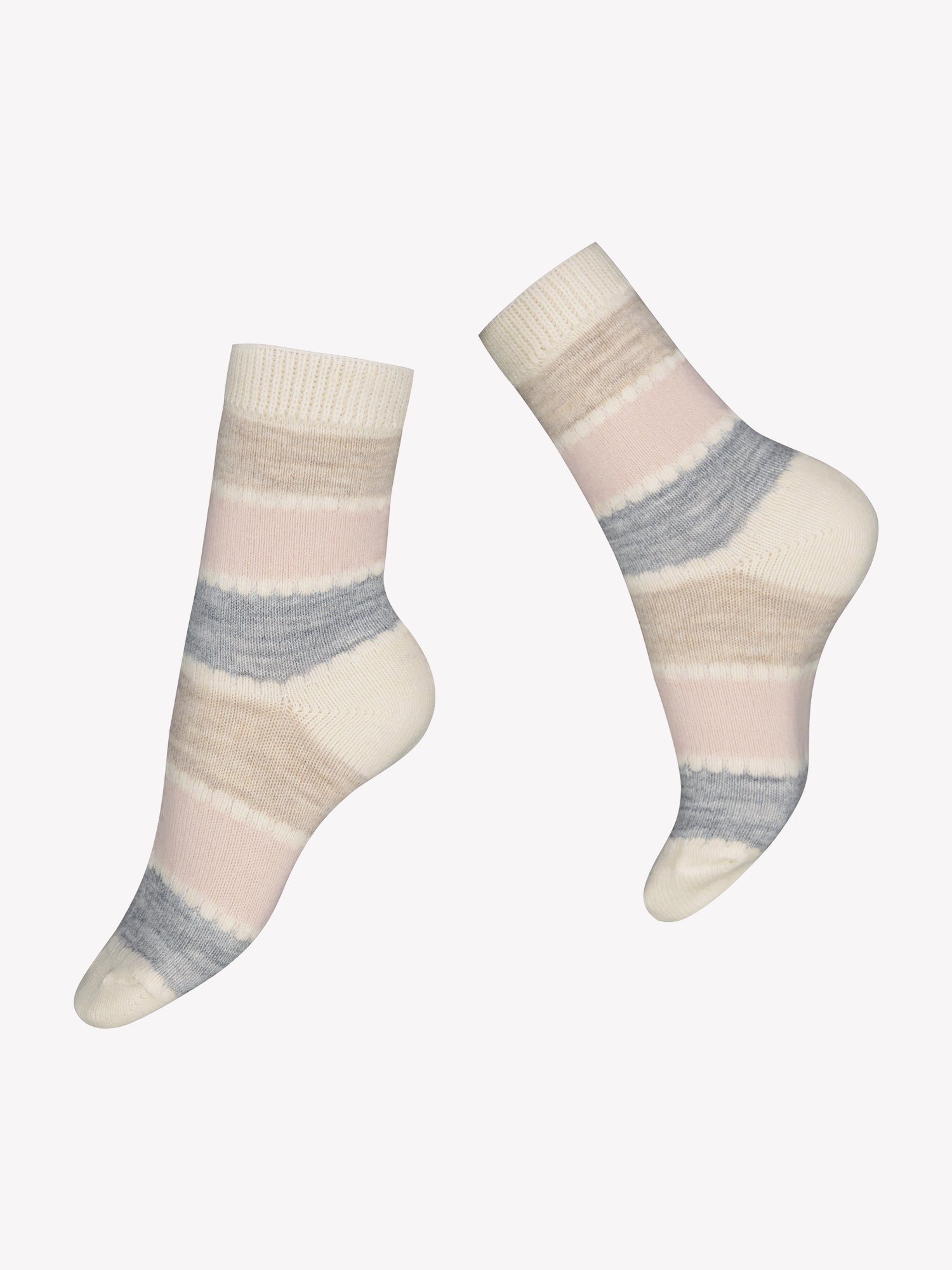 Vogue's Camilla ankle socks with stripe patterns in off-white, light blue, light pink and light brown in a product picture.