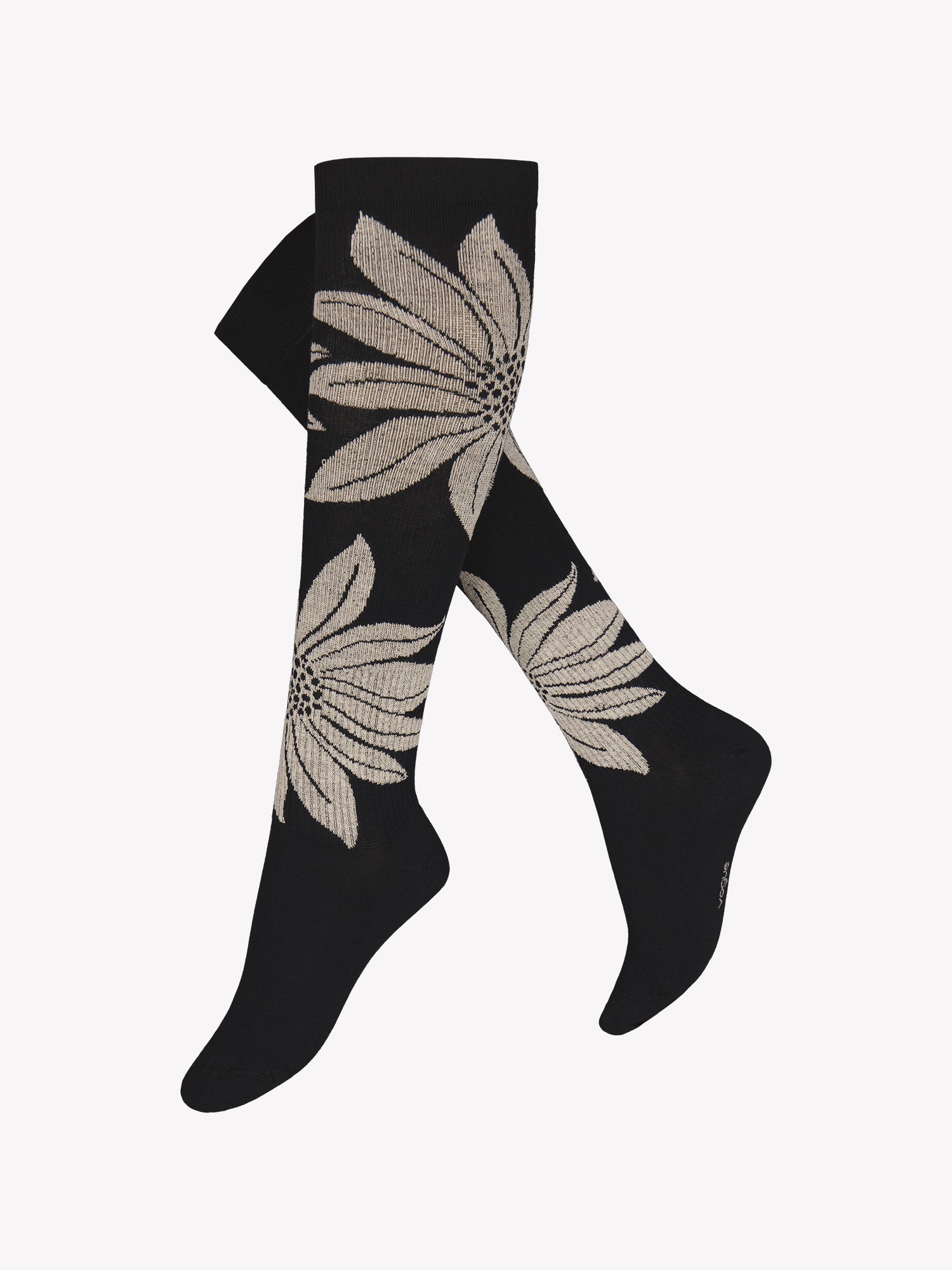 Vogue's black high-quality organic cotton knee-high socks with a flower pattern in a product picture.
