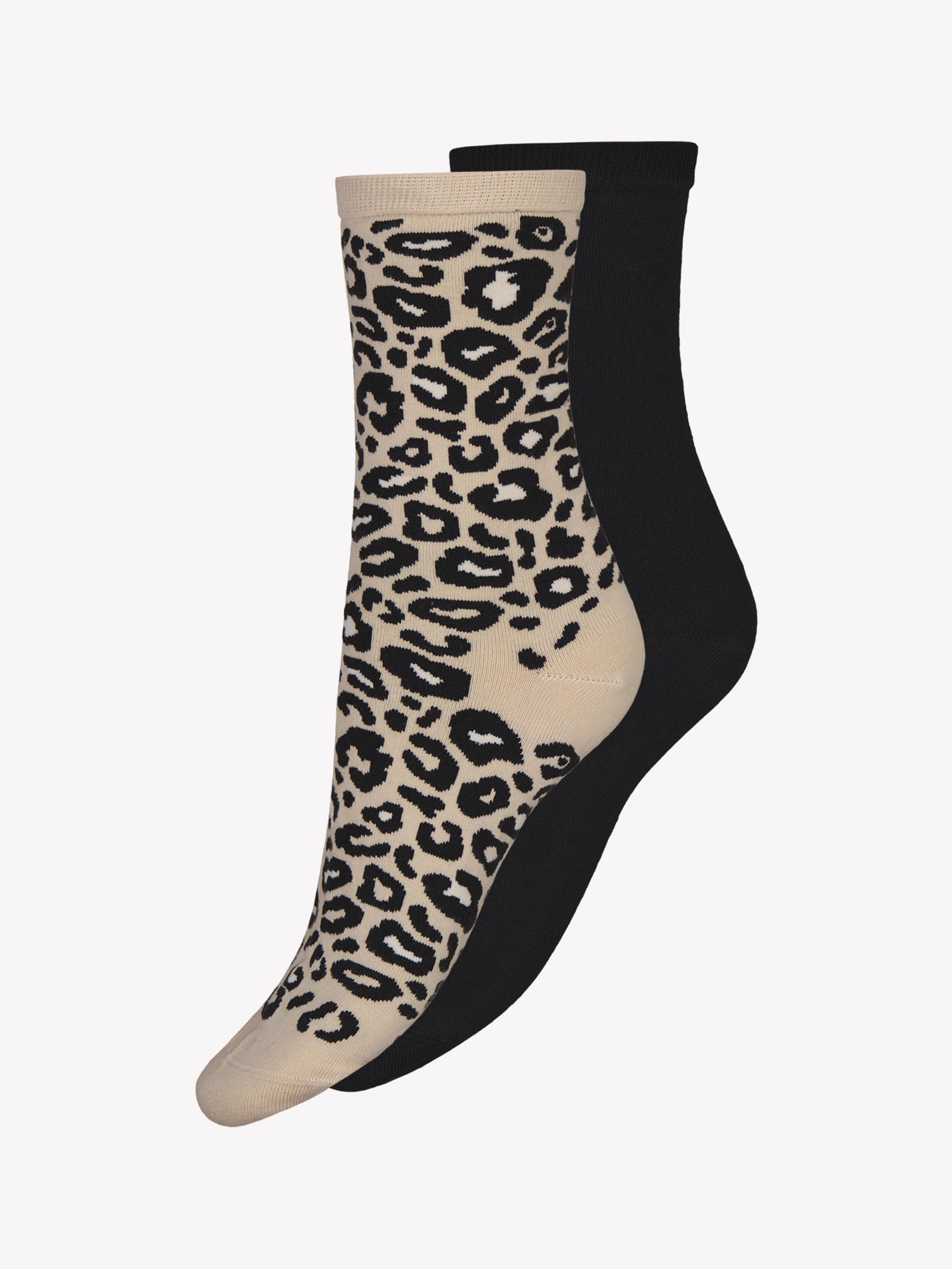 Vogue's Leo ankle socks with a leopard pattern pair and one black pair in a product picture.