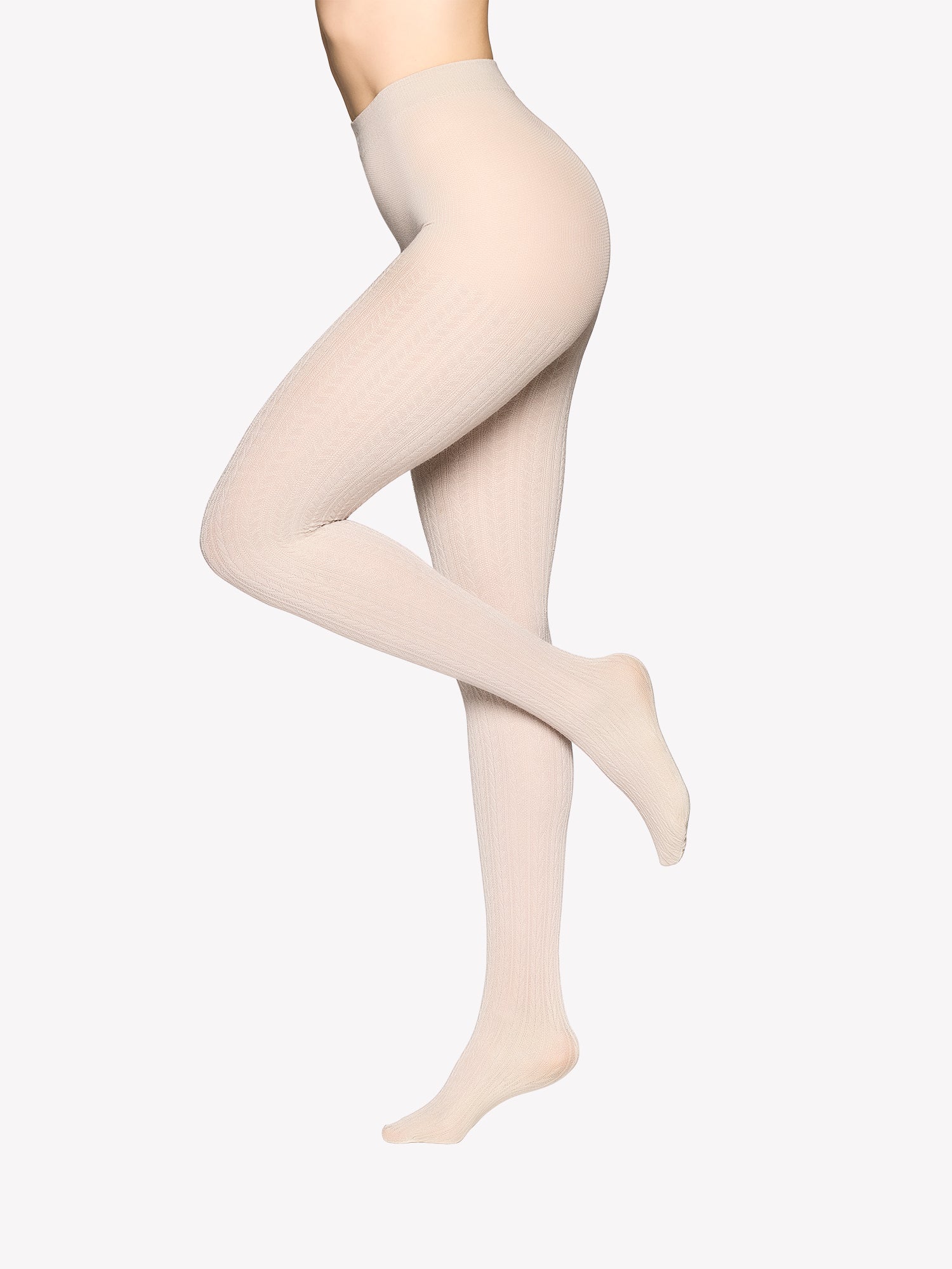 Vogue’s Ellen viscose tights in a sand color with a cable knit pattern, shown in a product image.