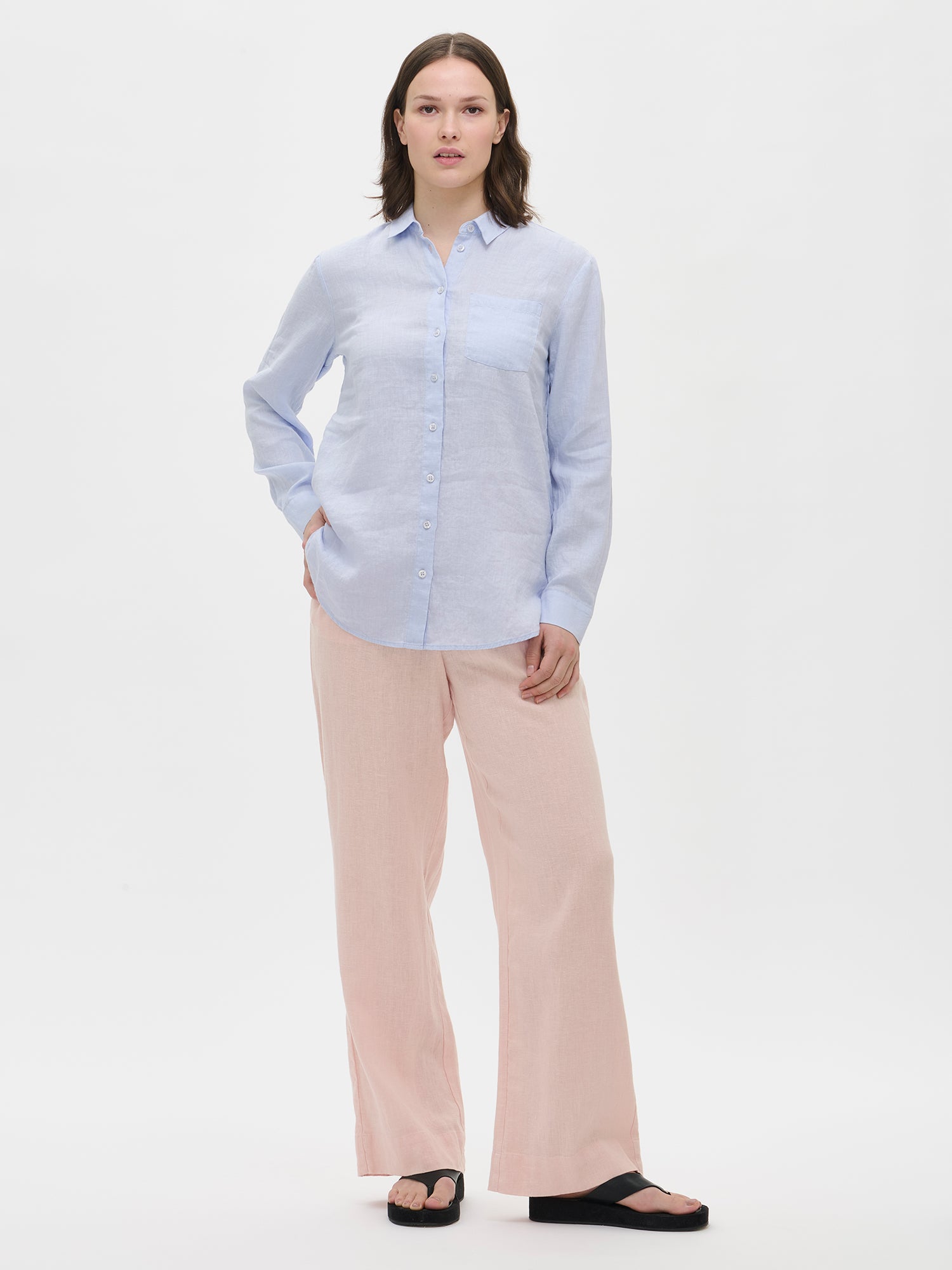 Nanso women's relaxed long-sleeved light blue Linen shirt paired with matching linen trousers on the model.