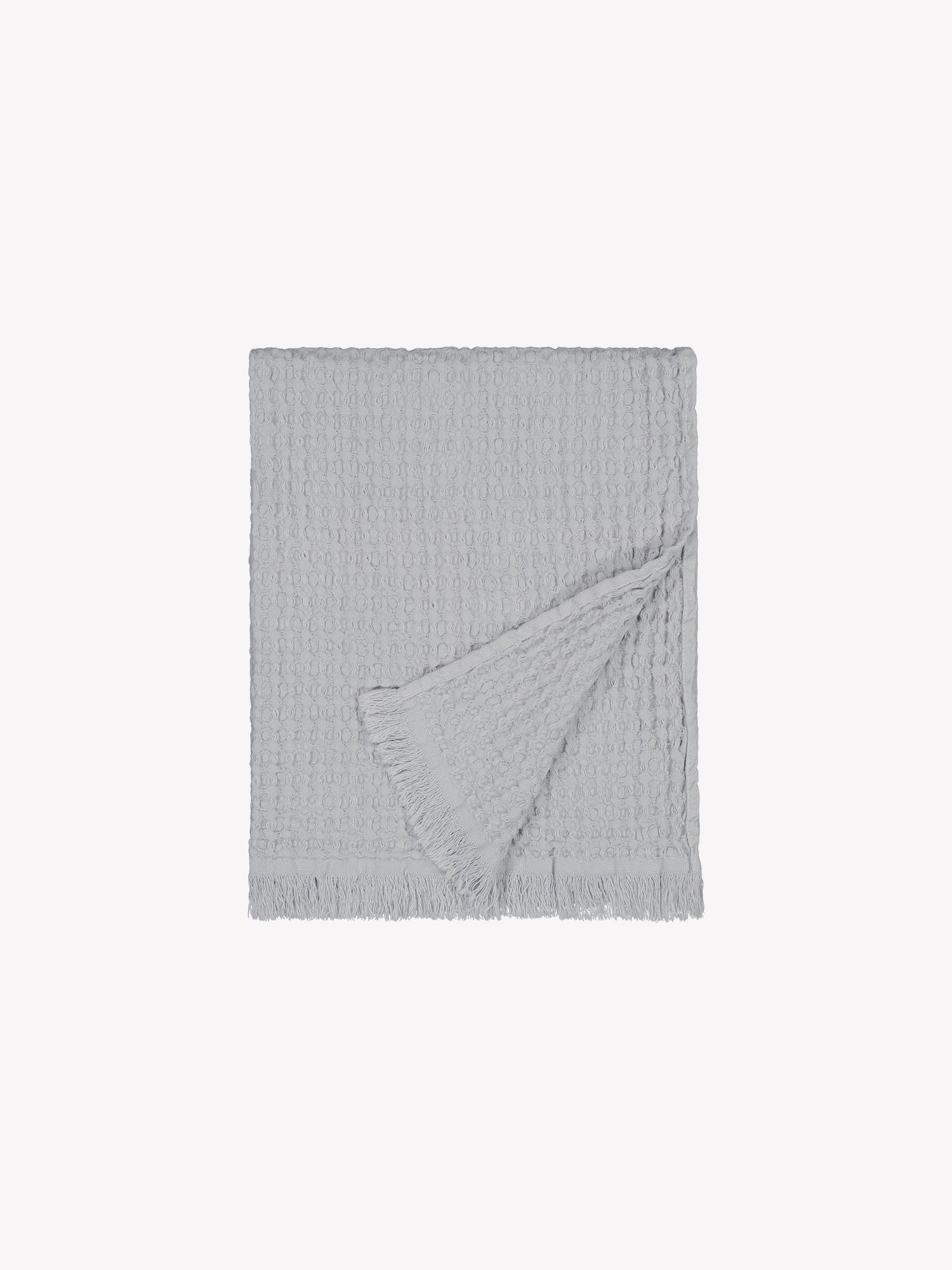 Vohveli hand towel in beautiful grey folded