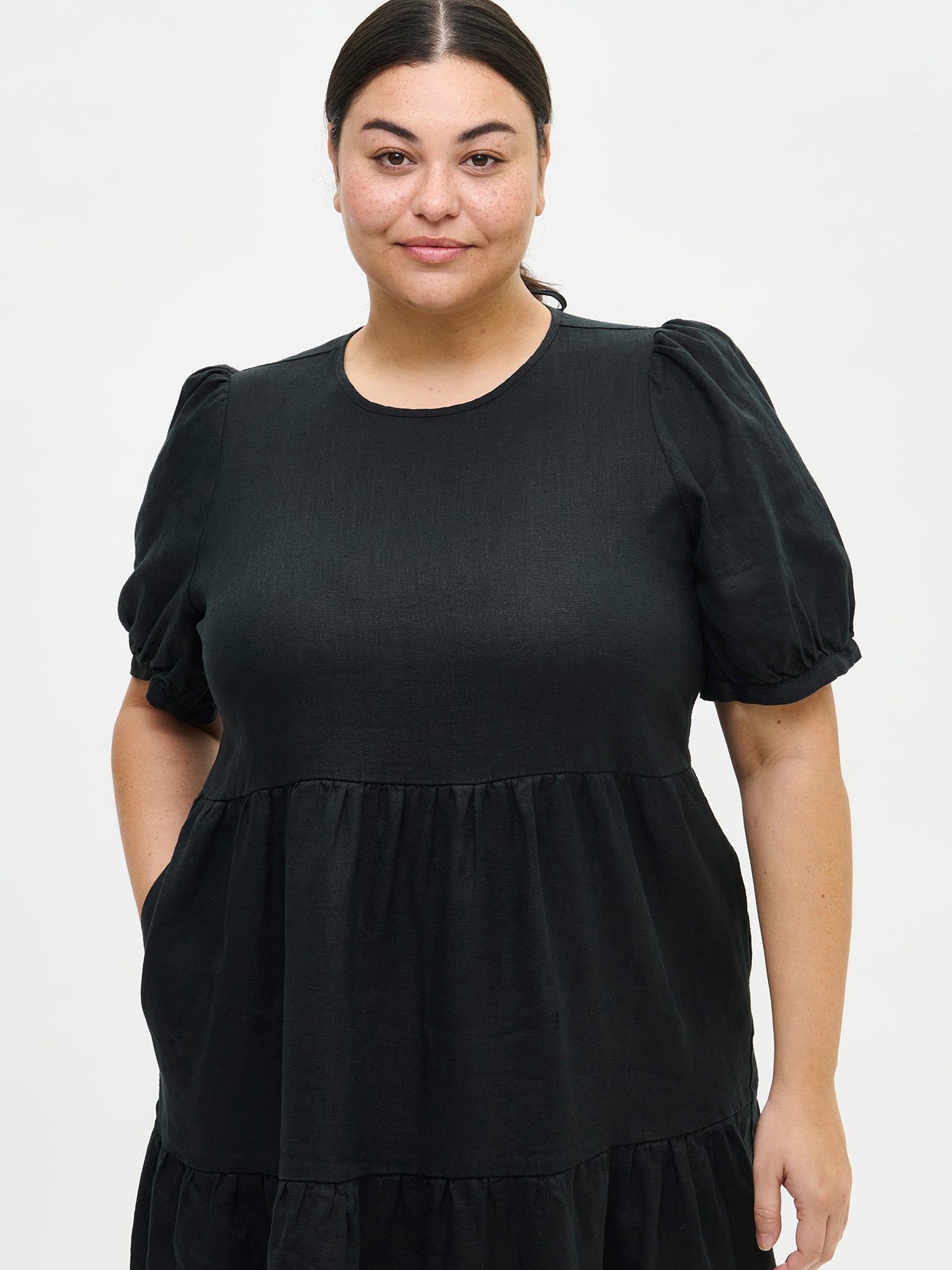 Nanso women's beautiful black Sarastus midi linen dress features voluminous frill layers and short puff sleeves in size XL